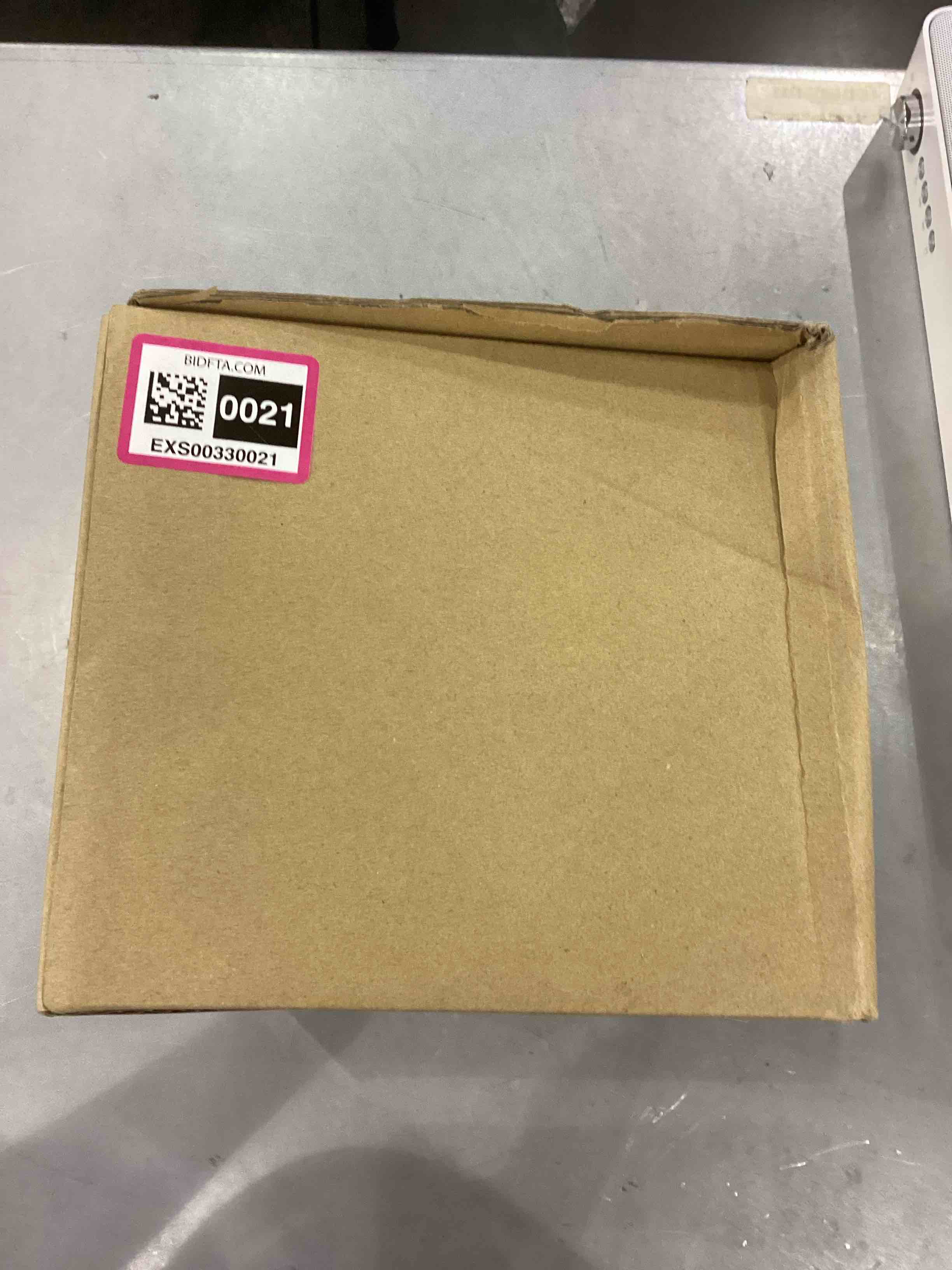 https://s3.amazonaws.com/lotting-images-prod/bidfta/EXS00330021_1689332955057.jpeg
