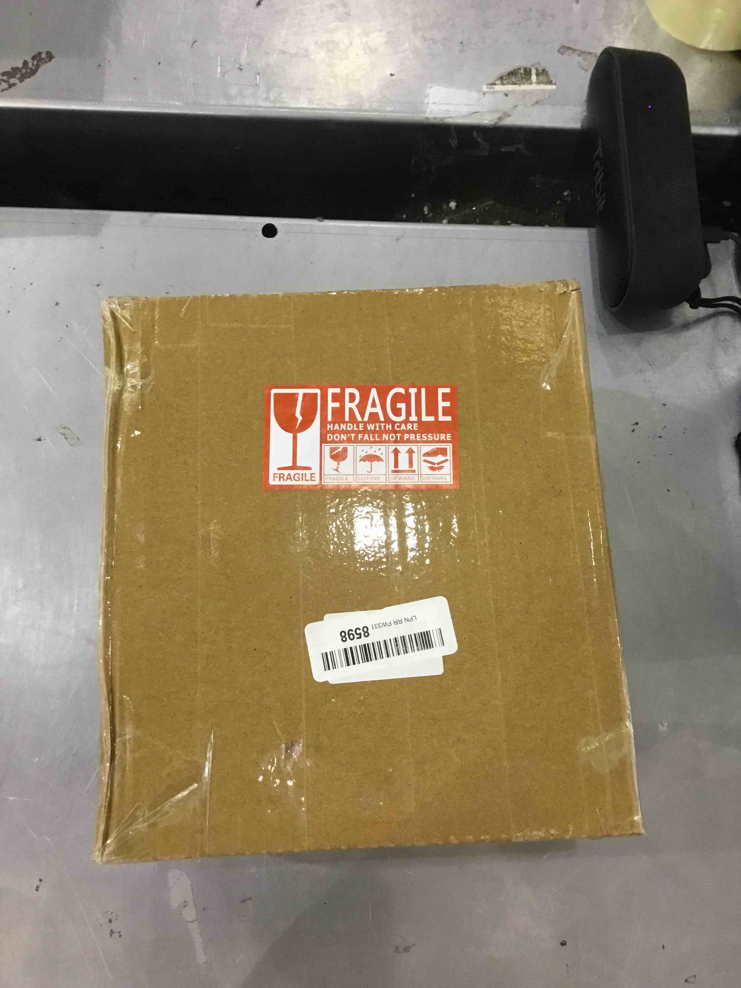 https://s3.amazonaws.com/lotting-images-prod/bidfta/EXS00331151_1689334855003.jpeg