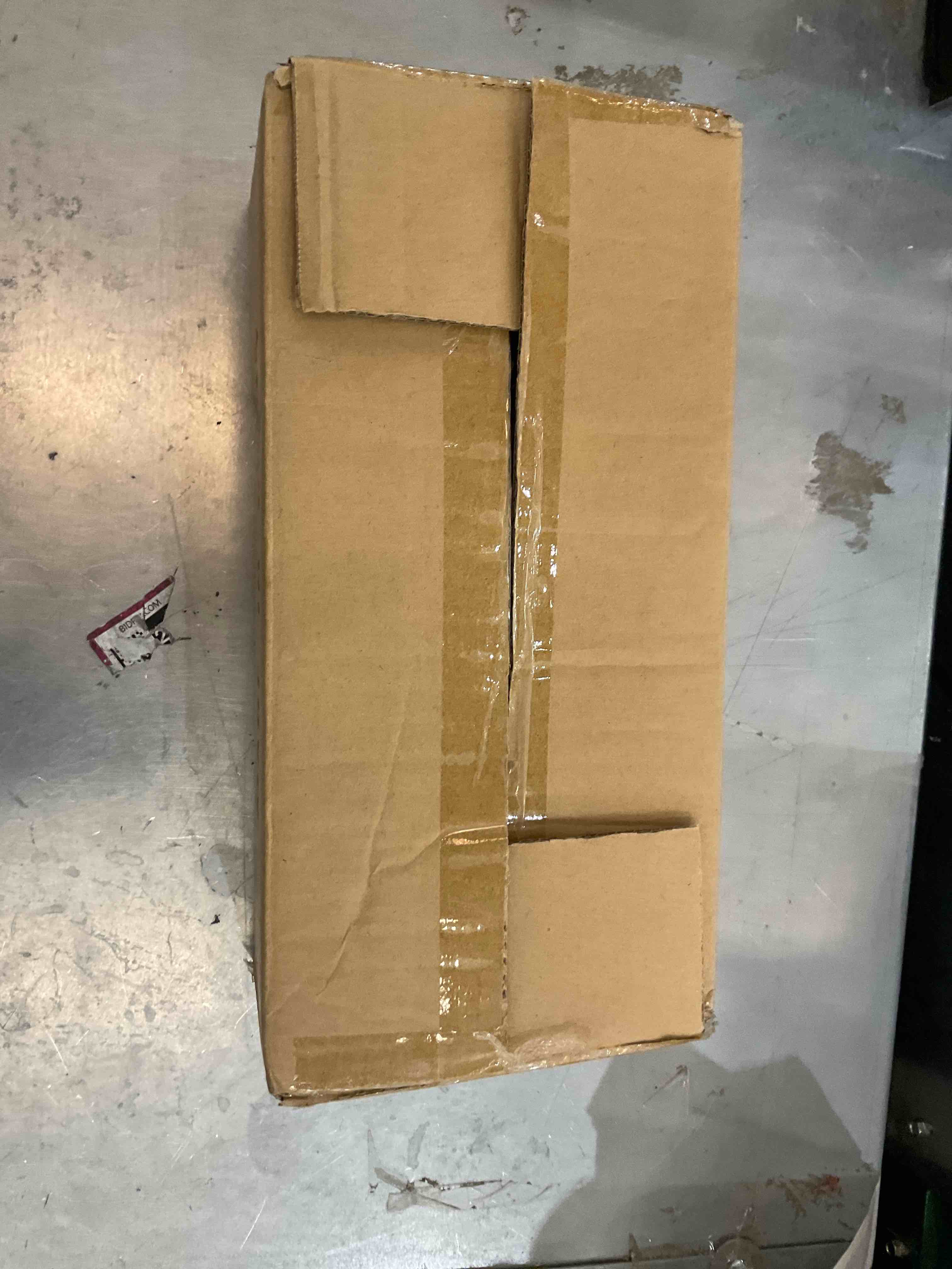 https://s3.amazonaws.com/lotting-images-prod/bidfta/EXS00337403_1689267177594.jpeg