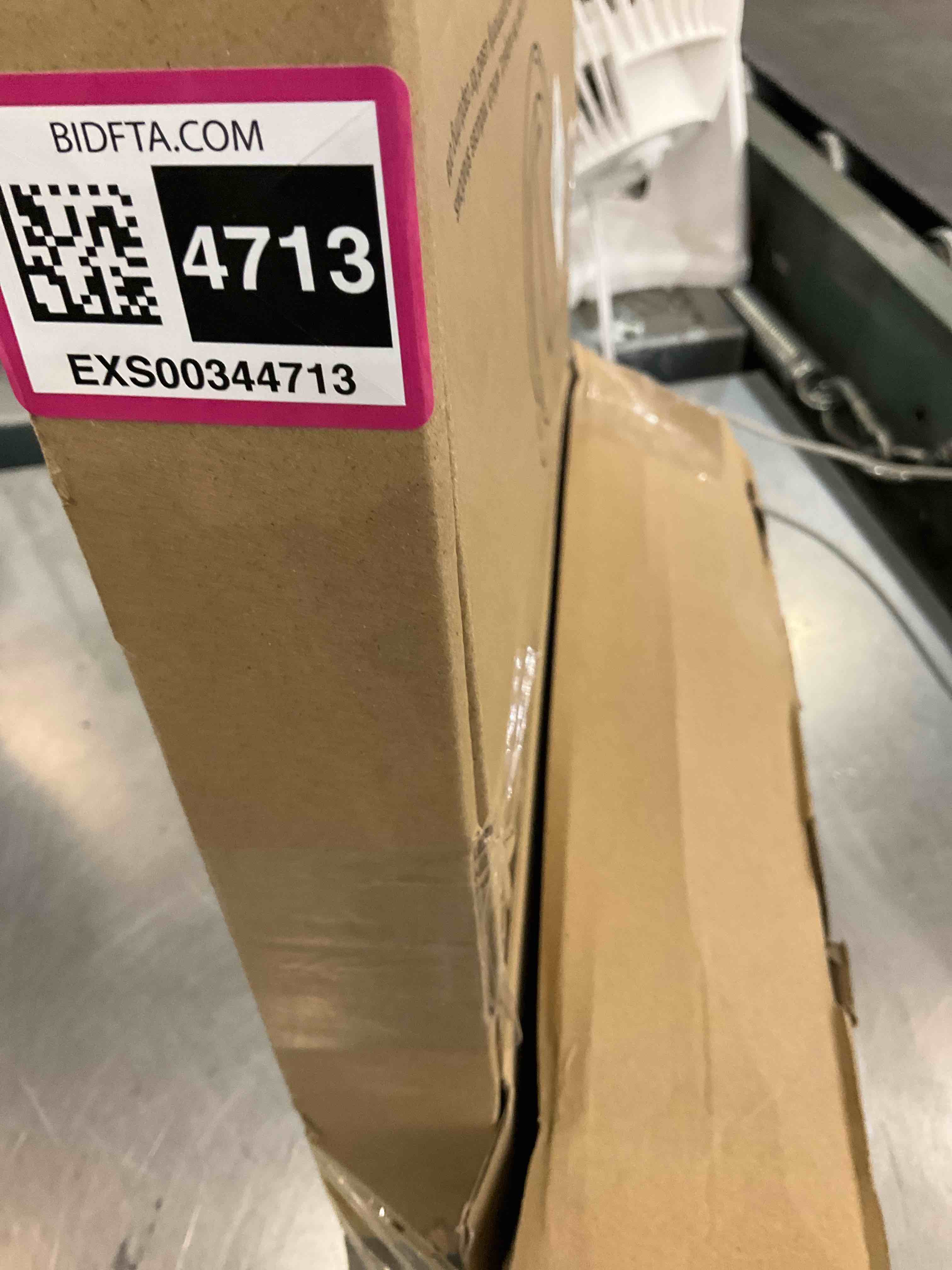 https://s3.amazonaws.com/lotting-images-prod/bidfta/EXS00344713_1690381132470.jpeg