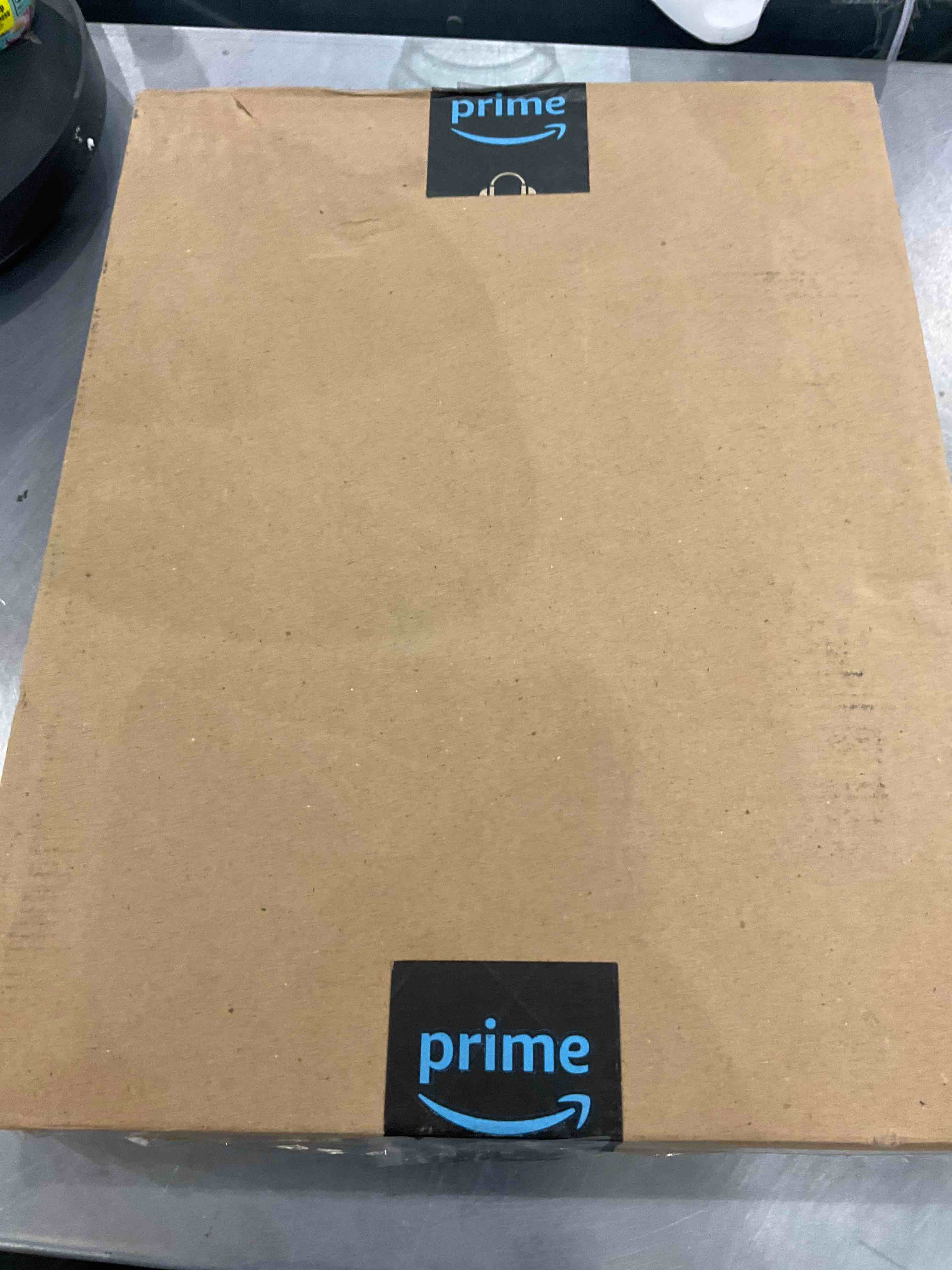 https://s3.amazonaws.com/lotting-images-prod/bidfta/EXS00352113_1689861468336.jpeg