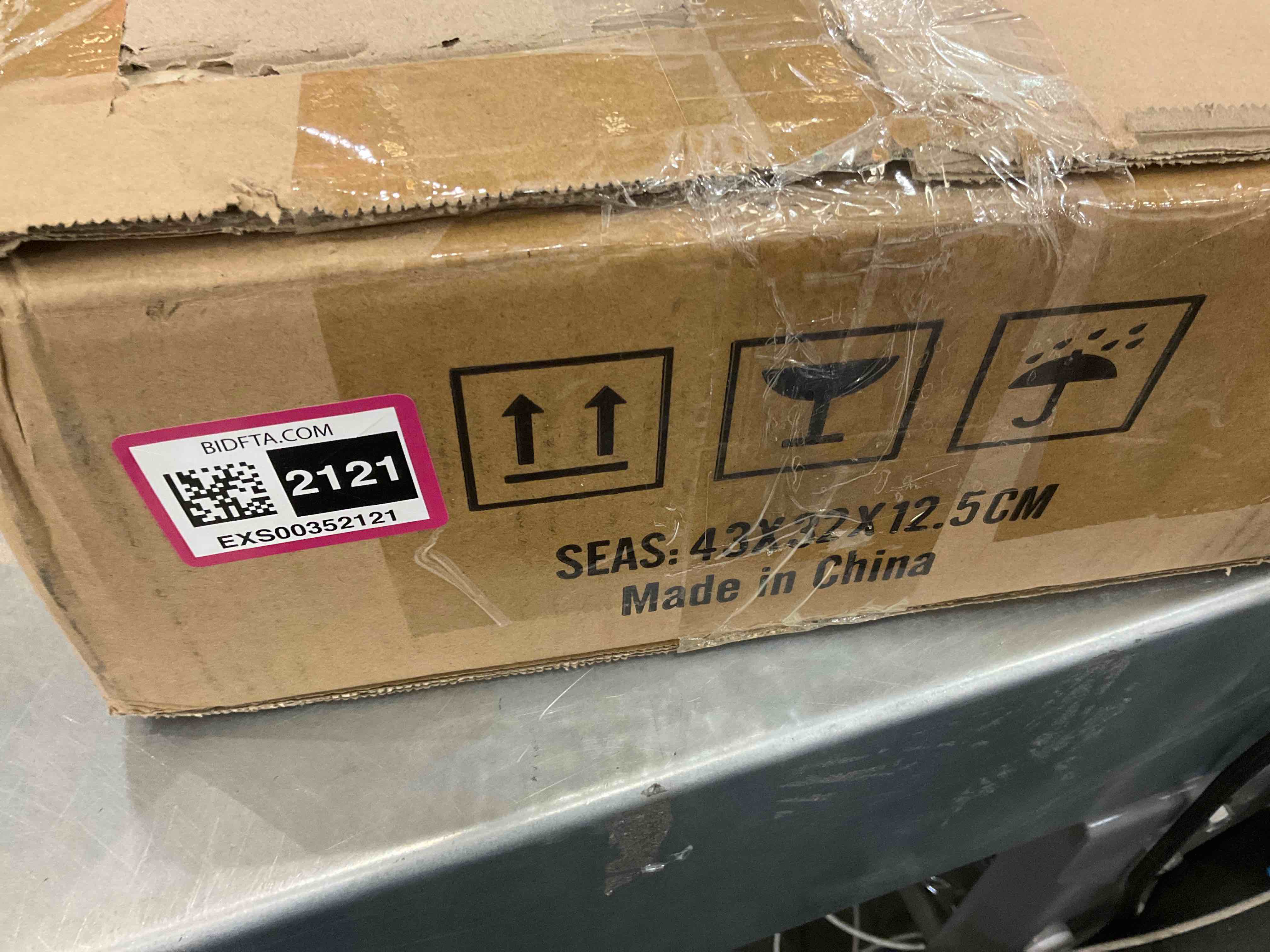 https://s3.amazonaws.com/lotting-images-prod/bidfta/EXS00352121_1689863729840.jpeg