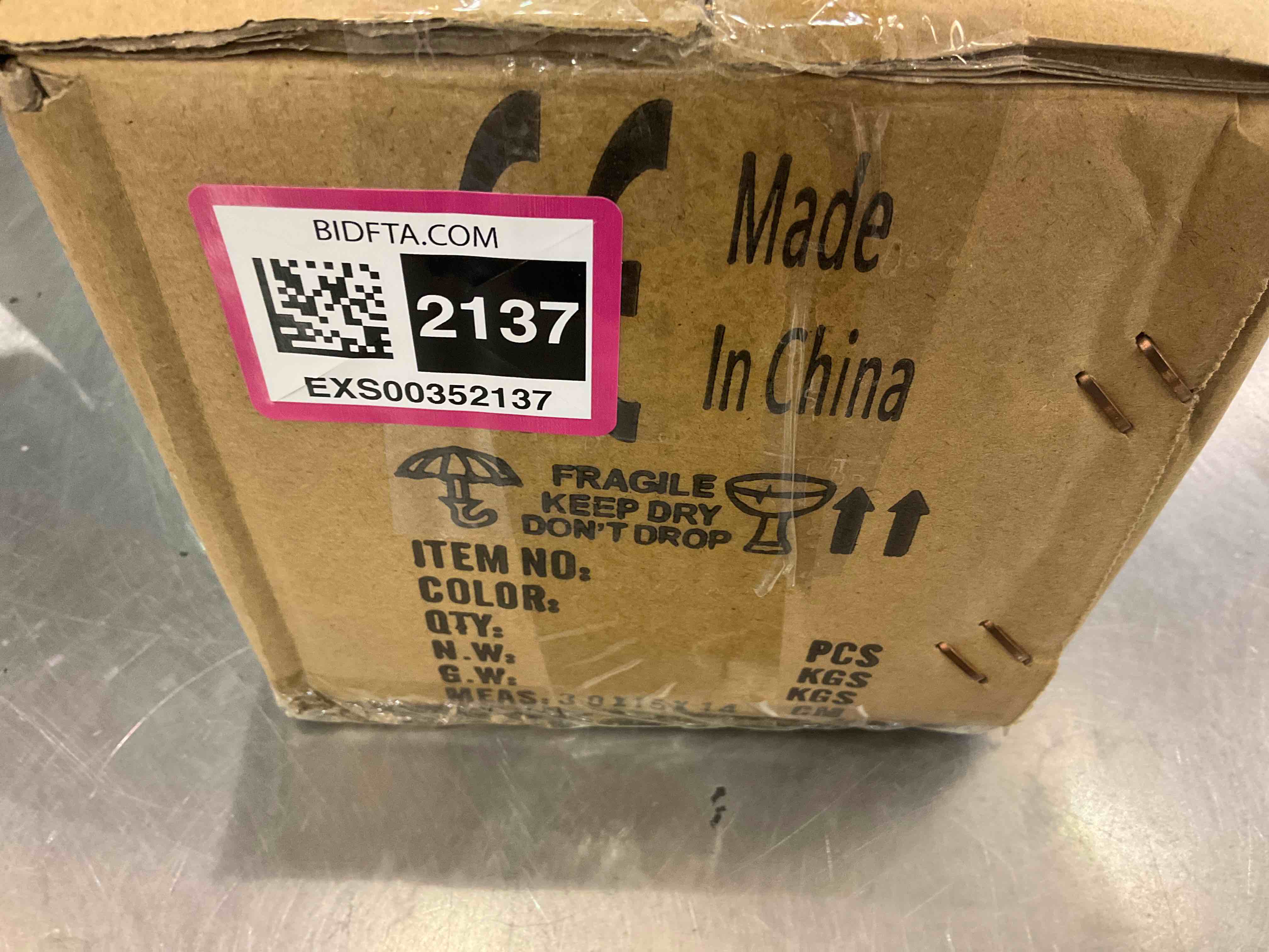 https://s3.amazonaws.com/lotting-images-prod/bidfta/EXS00352137_1689866509103.jpeg