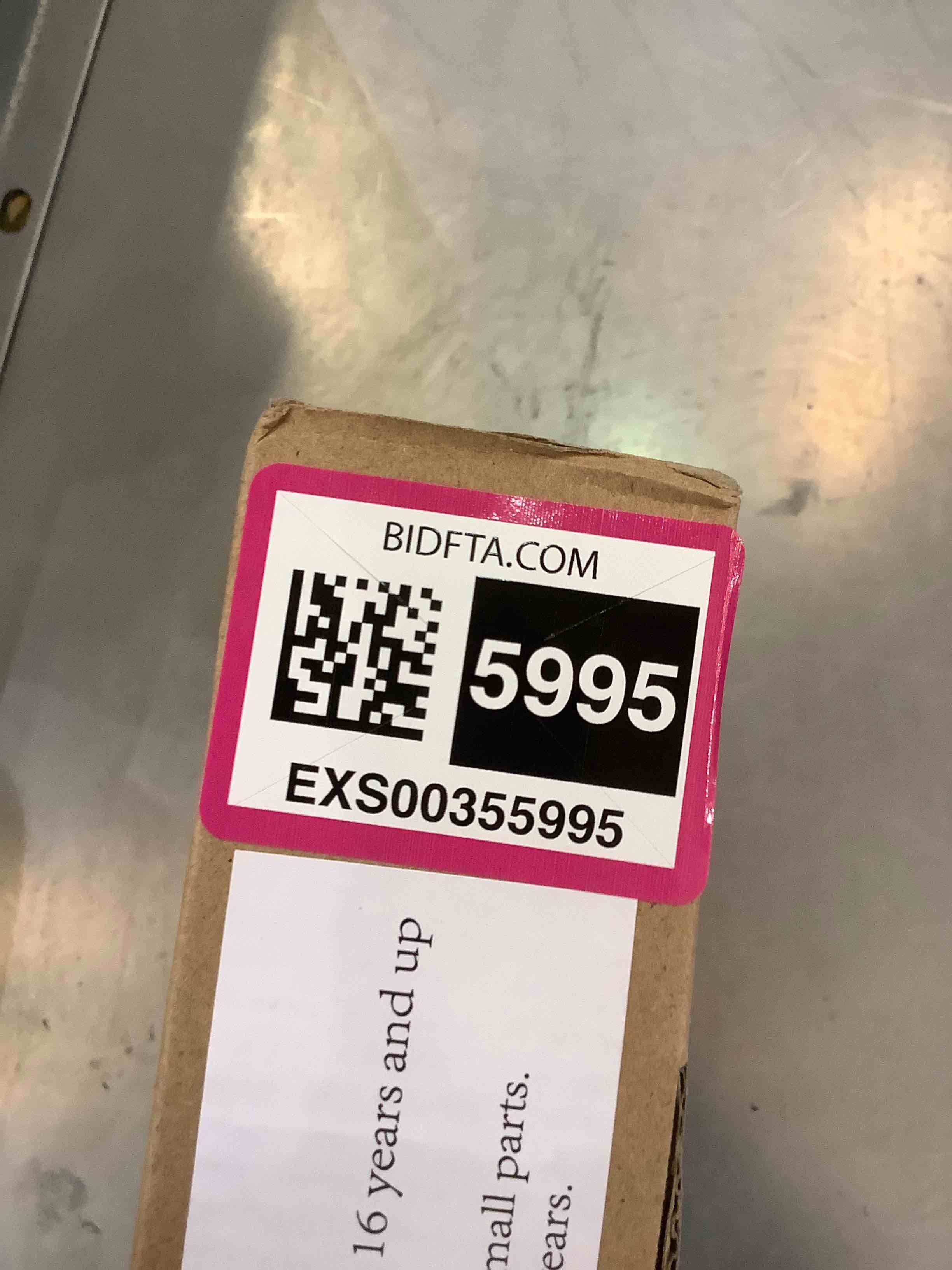 https://s3.amazonaws.com/lotting-images-prod/bidfta/EXS00355995_1690483184808.jpeg