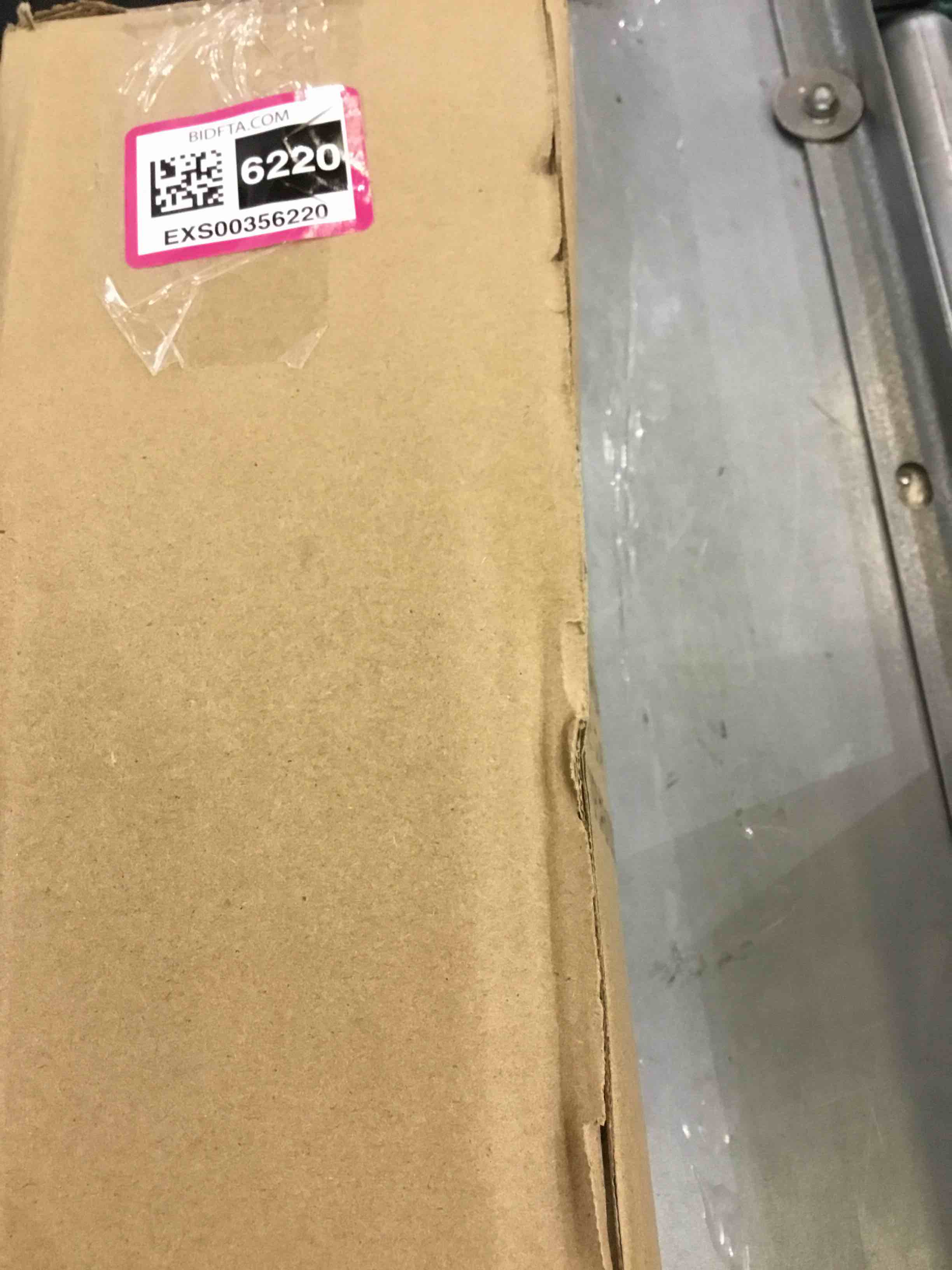 https://s3.amazonaws.com/lotting-images-prod/bidfta/EXS00356220_1690393884703.jpeg