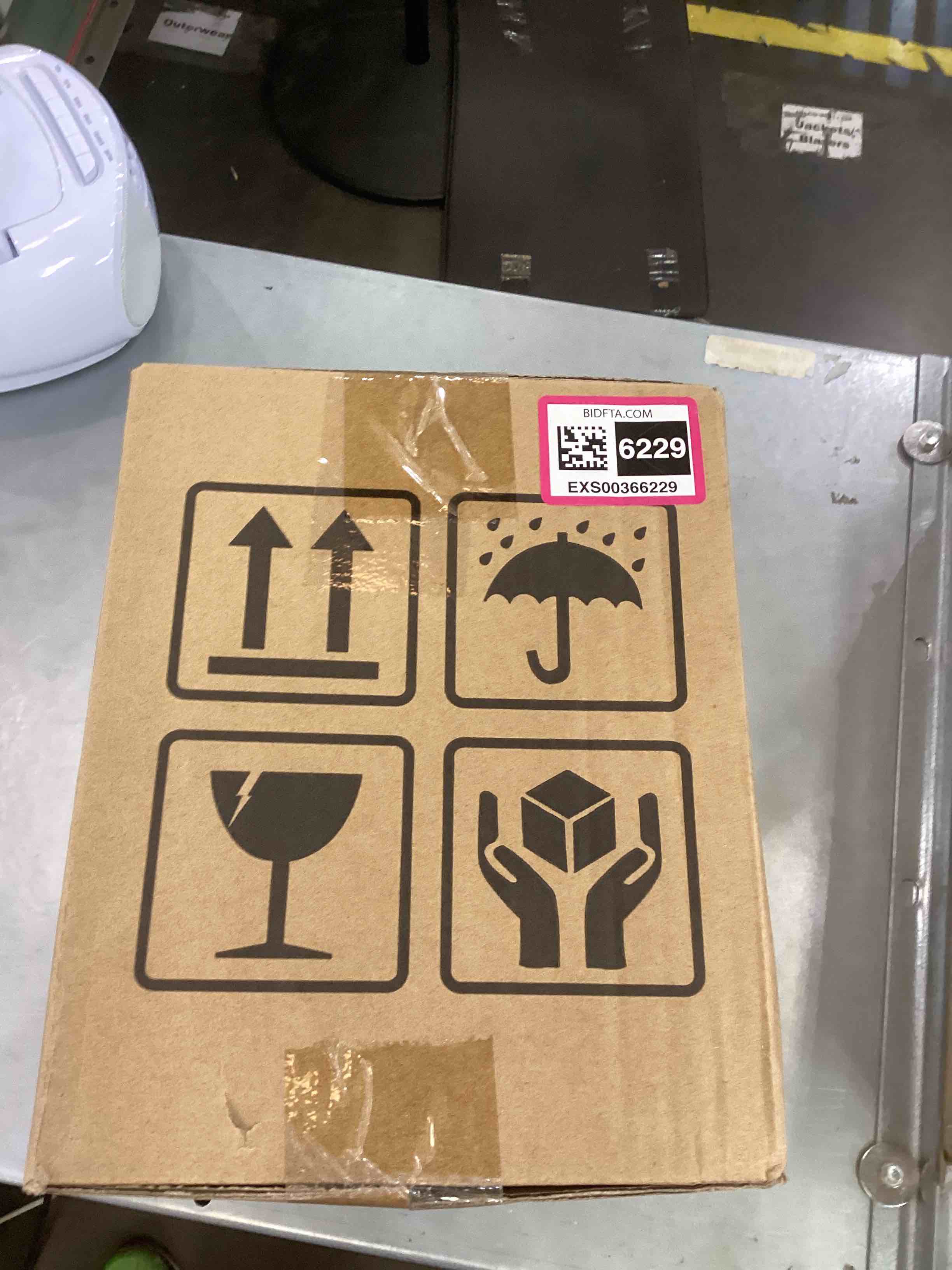 https://s3.amazonaws.com/lotting-images-prod/bidfta/EXS00366229_1690482767692.jpeg