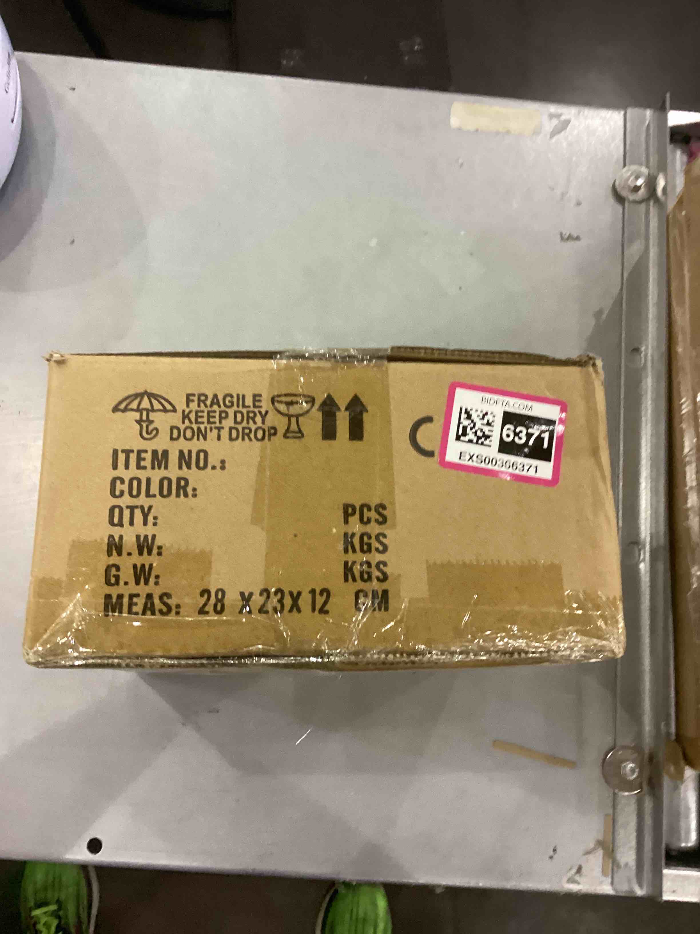 https://s3.amazonaws.com/lotting-images-prod/bidfta/EXS00366371_1690803195067.jpeg