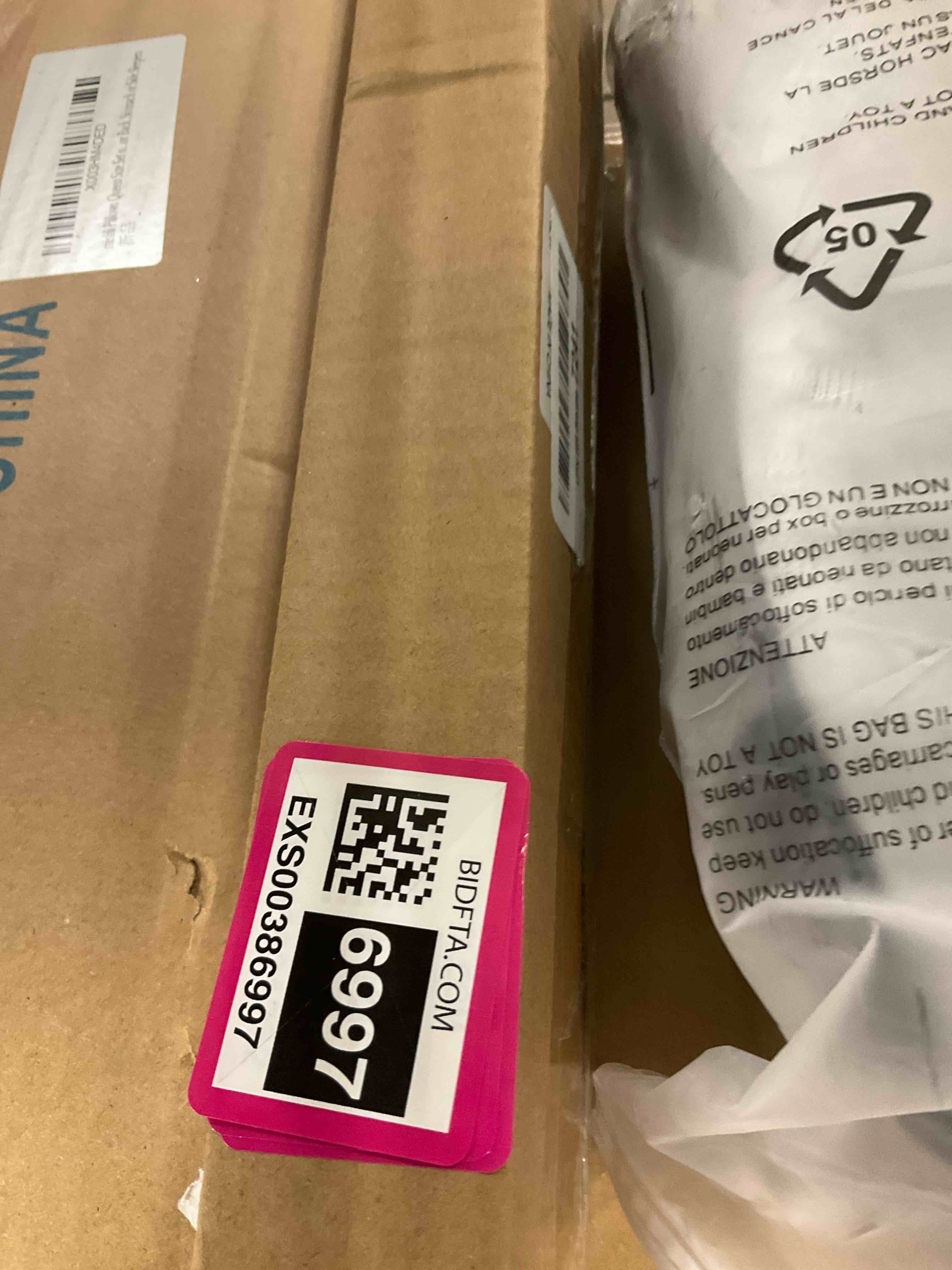 https://s3.amazonaws.com/lotting-images-prod/bidfta/EXS00386997_1703781479744.jpeg