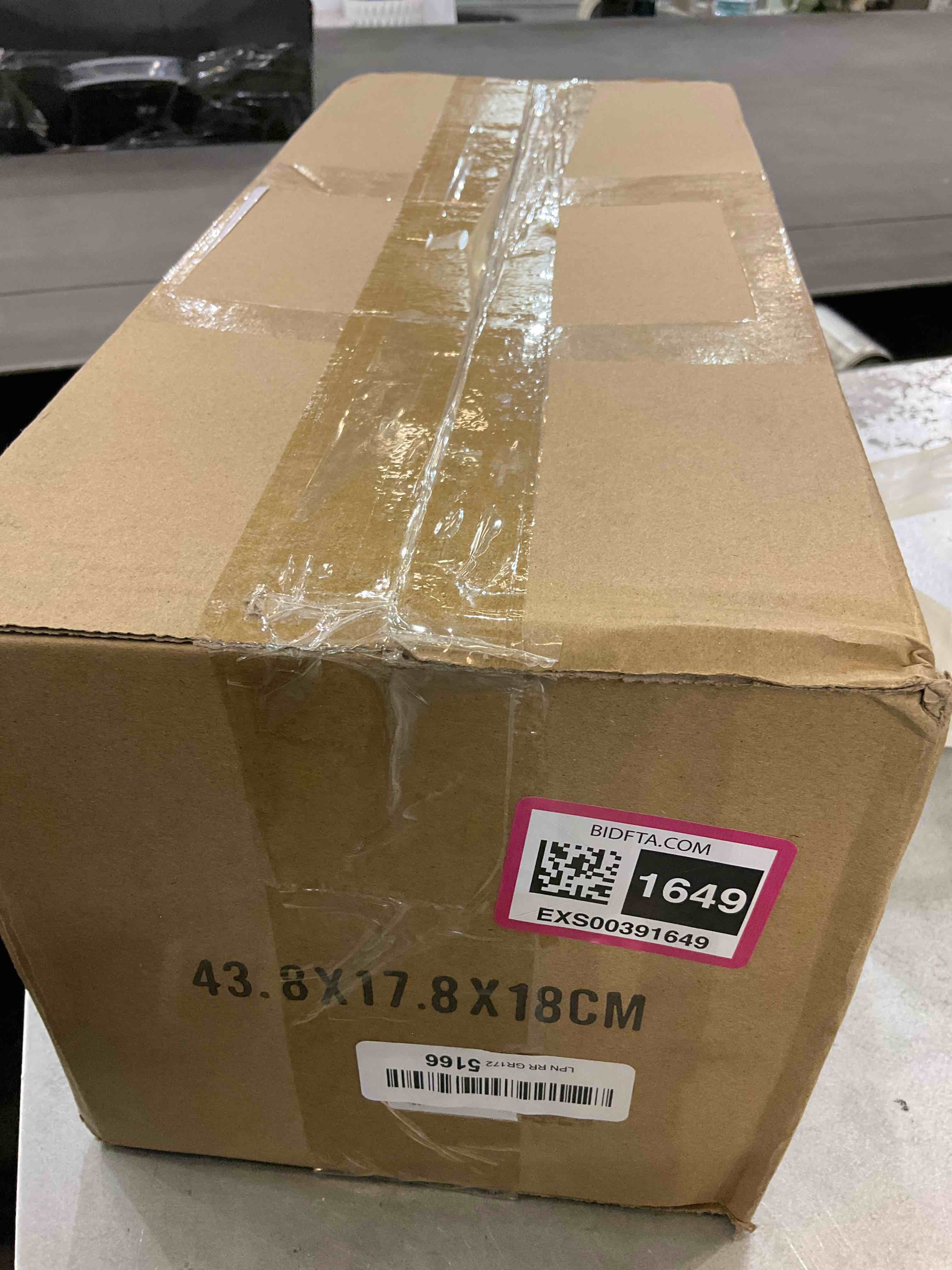 https://s3.amazonaws.com/lotting-images-prod/bidfta/EXS00391649_1691594158397.jpeg
