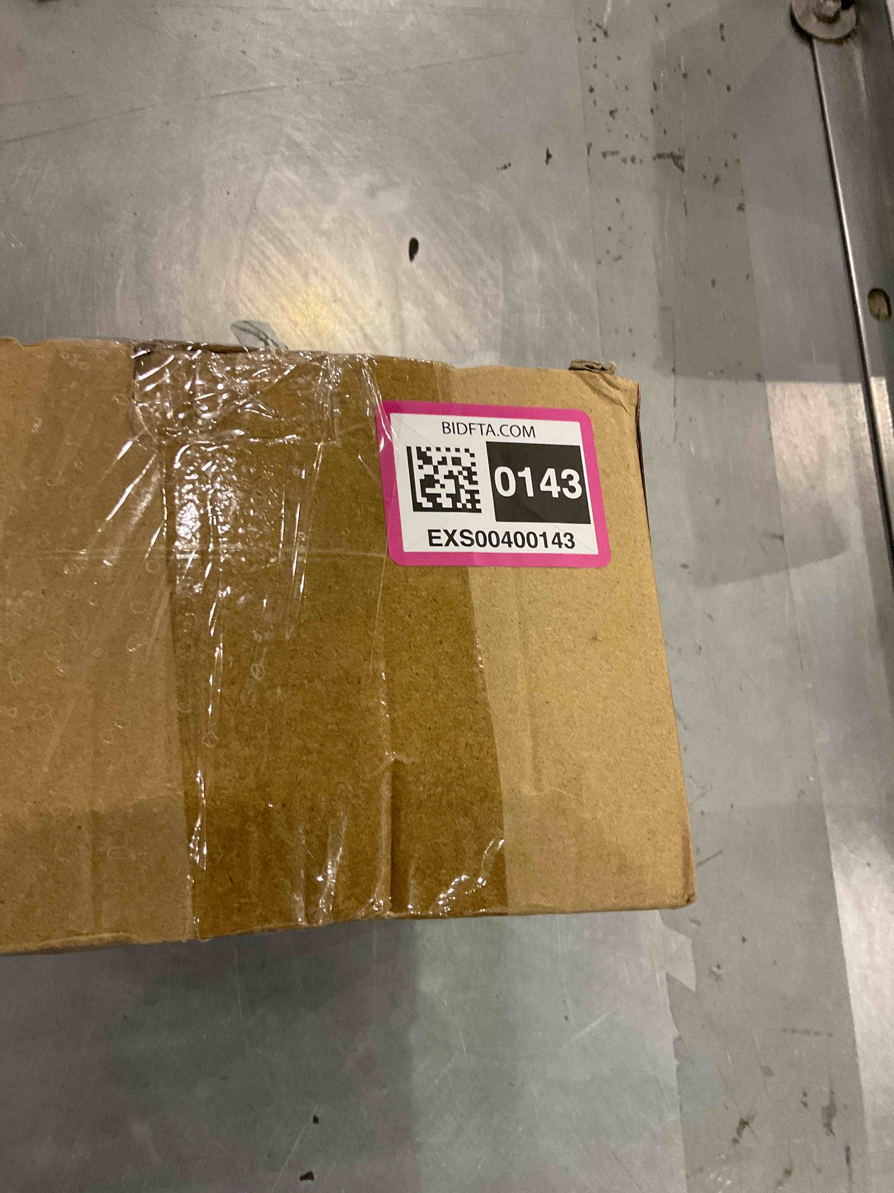 https://s3.amazonaws.com/lotting-images-prod/bidfta/EXS00400143_1695038048366.jpeg