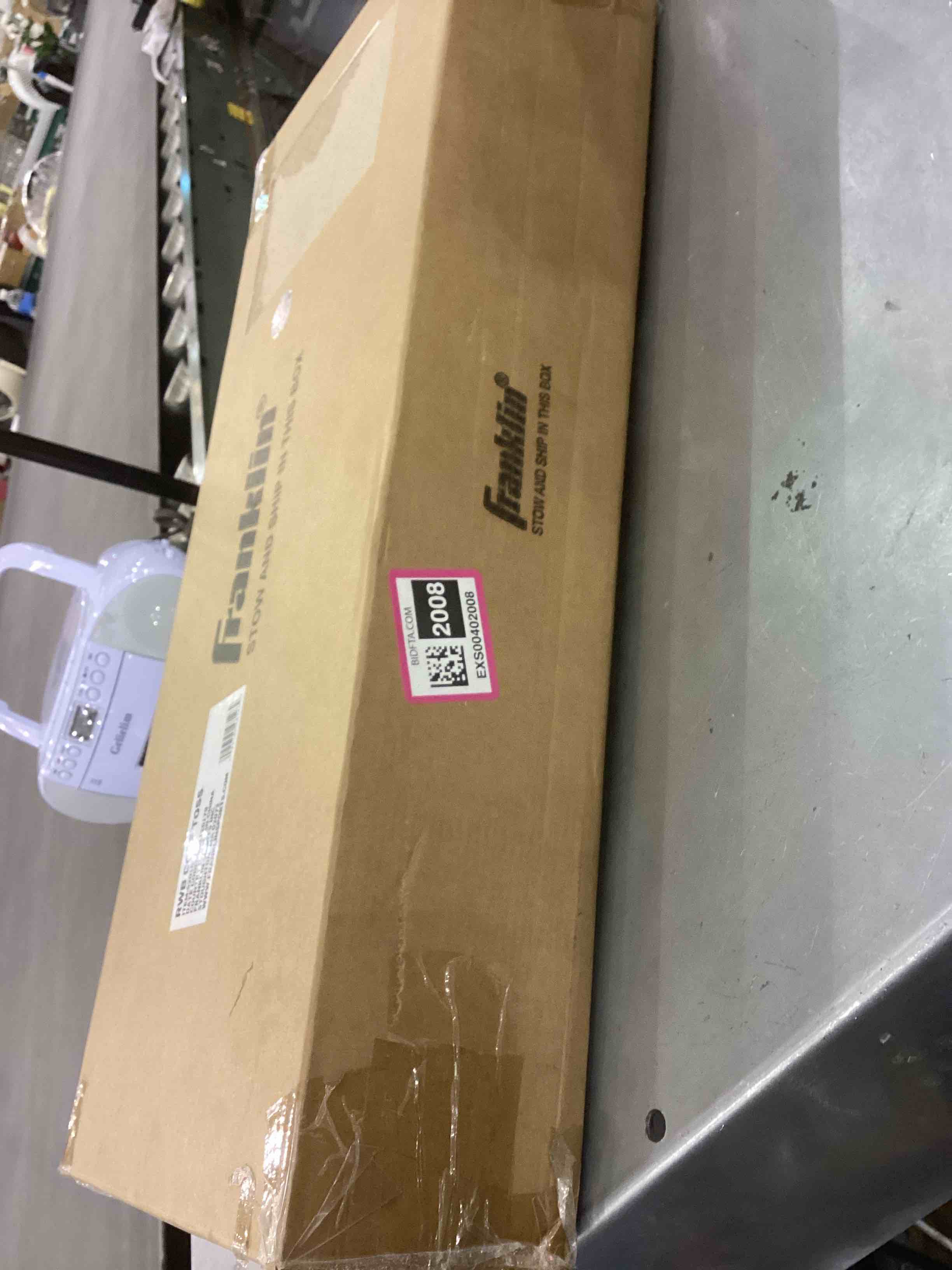 https://s3.amazonaws.com/lotting-images-prod/bidfta/EXS00402008_1693249894078.jpeg