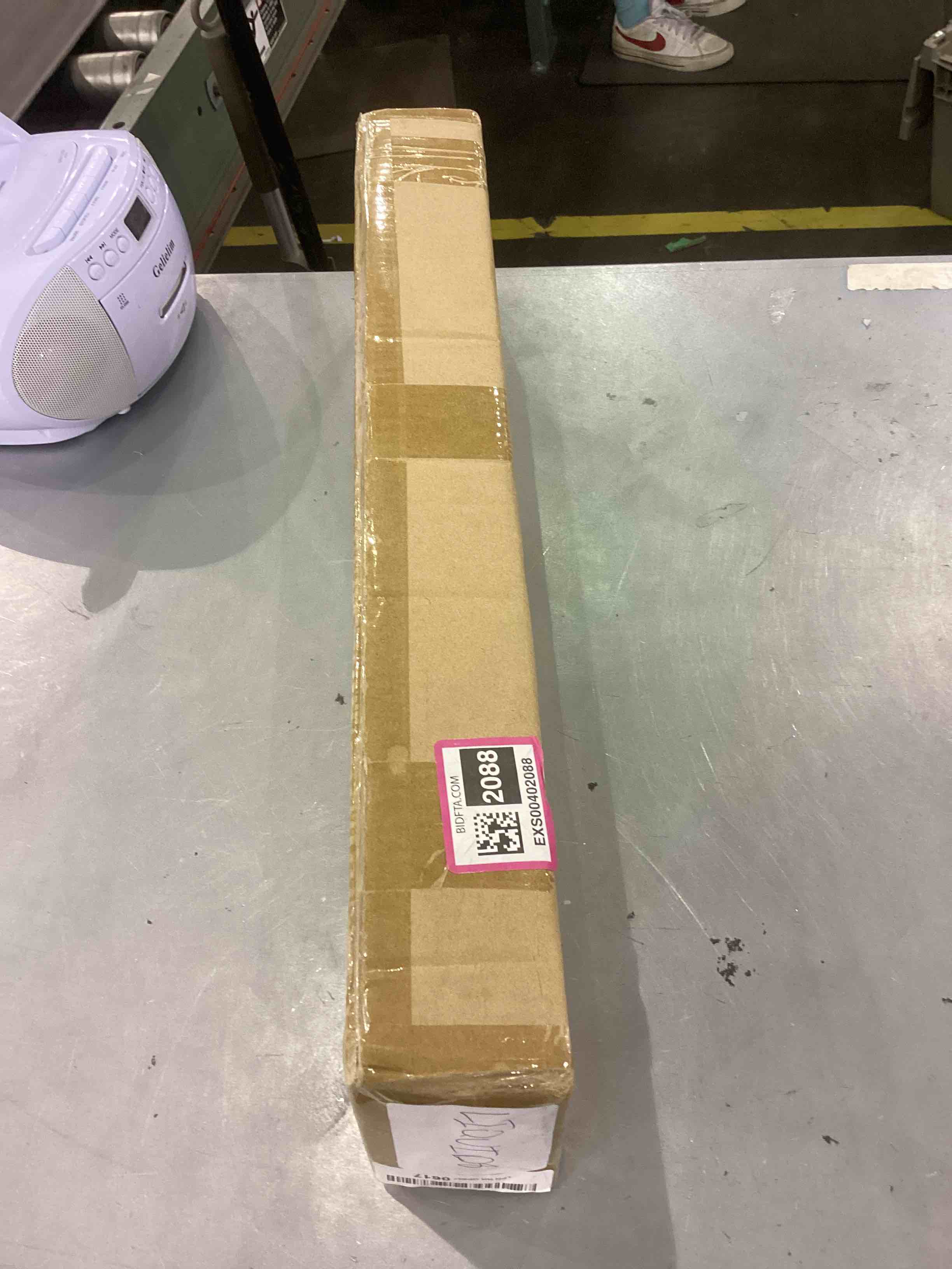 https://s3.amazonaws.com/lotting-images-prod/bidfta/EXS00402088_1693394757980.jpeg