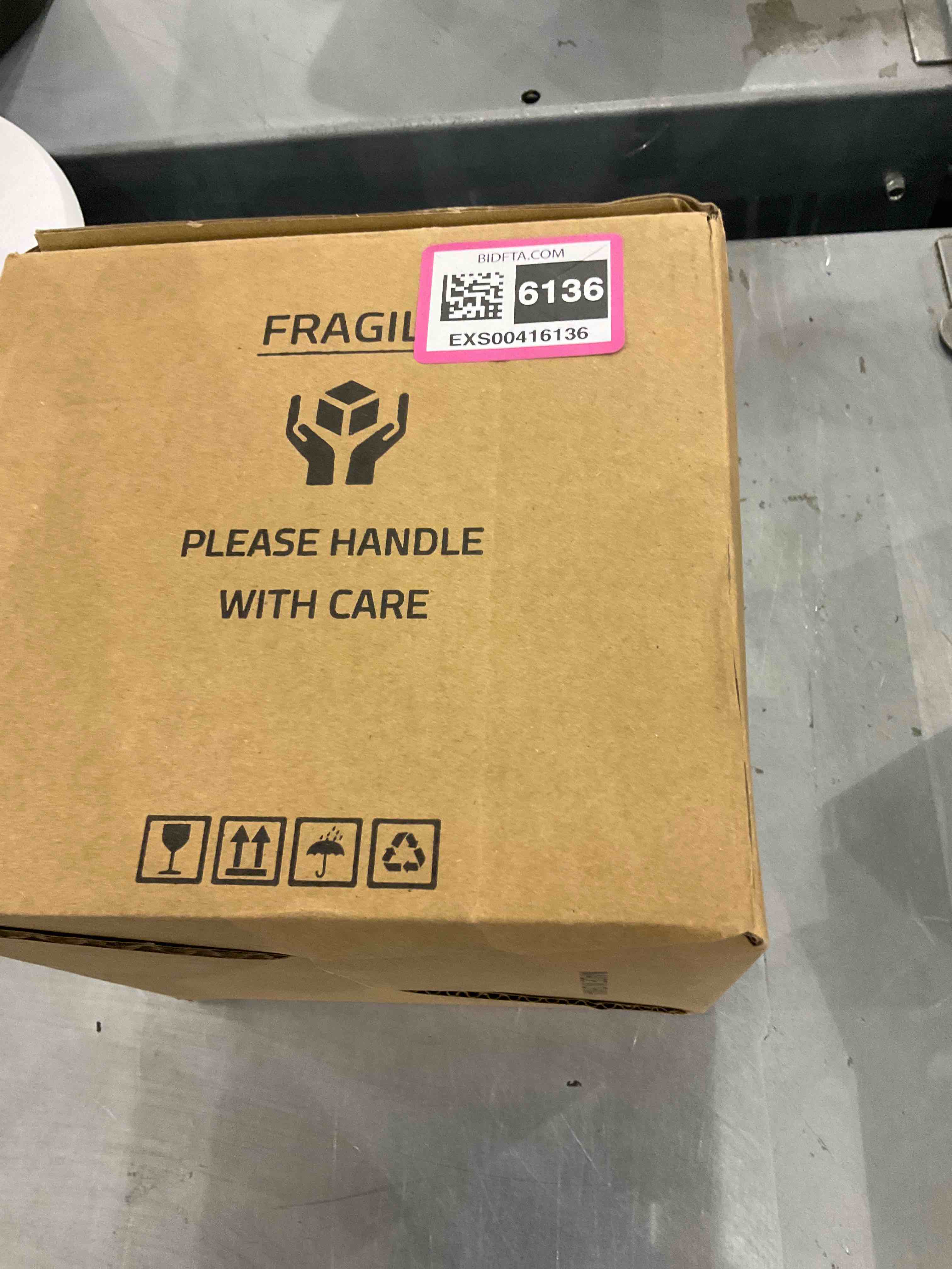 https://s3.amazonaws.com/lotting-images-prod/bidfta/EXS00416136_1692618213207.jpeg