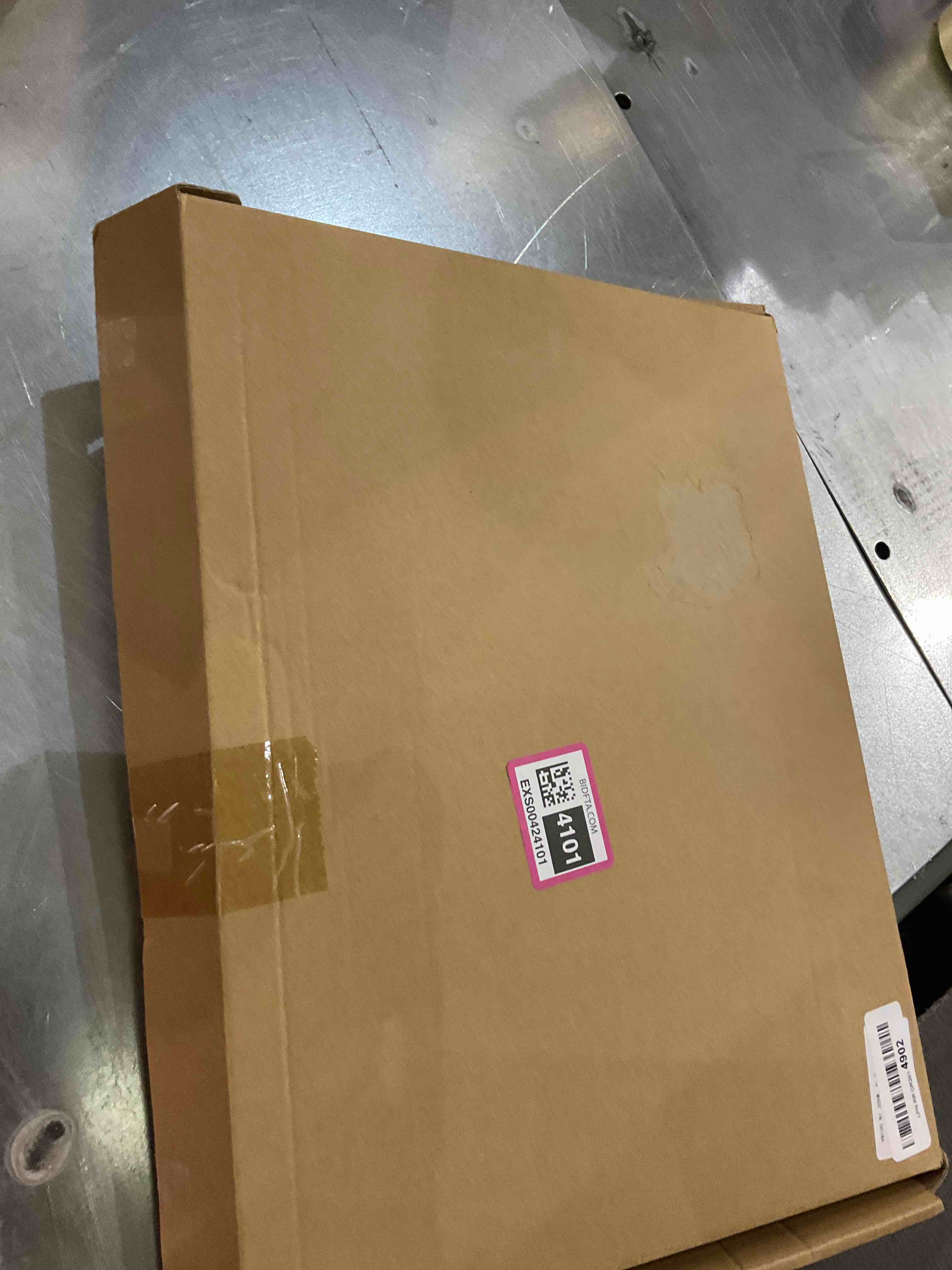 https://s3.amazonaws.com/lotting-images-prod/bidfta/EXS00424101_1693229557445.jpeg