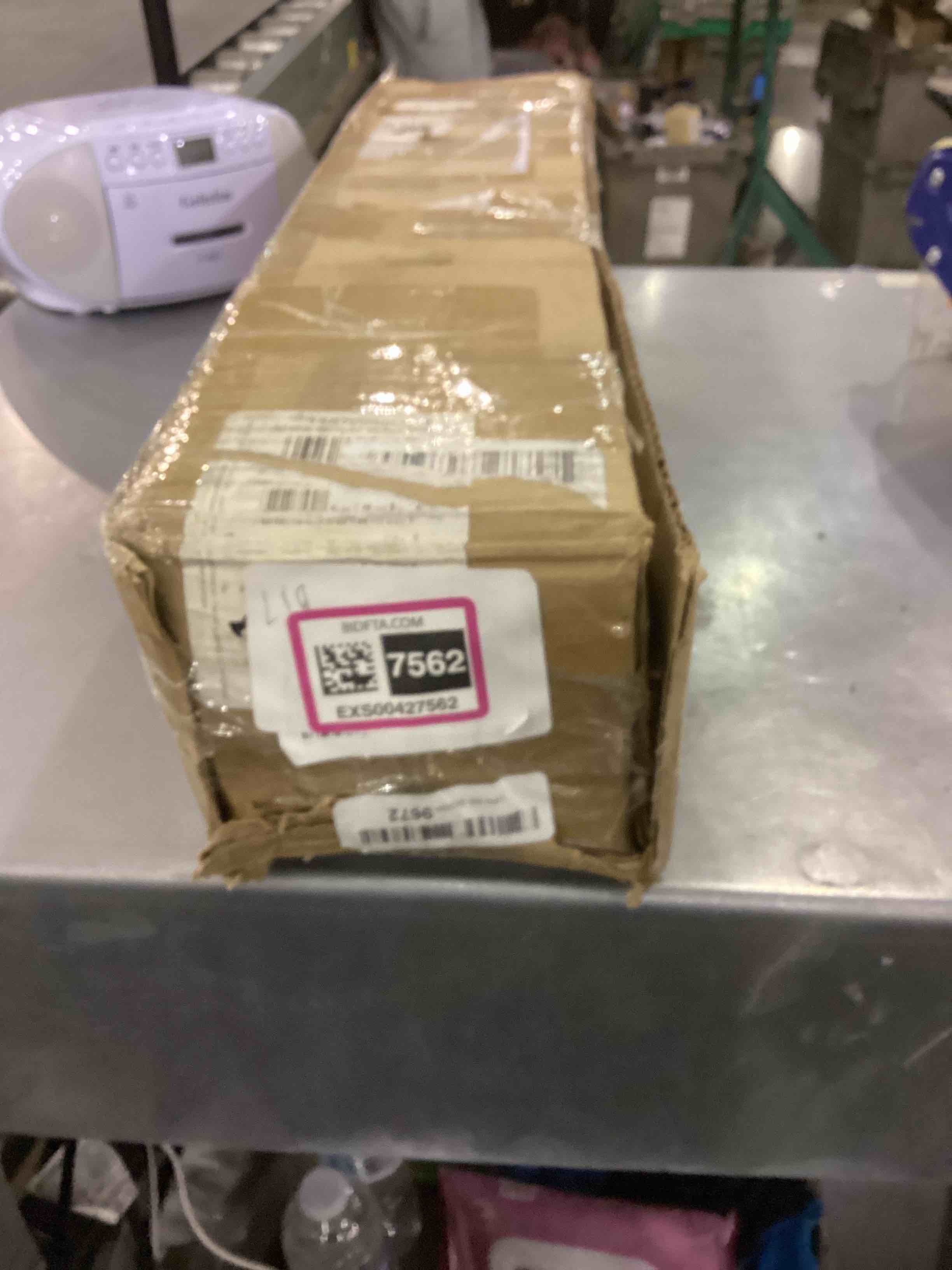https://s3.amazonaws.com/lotting-images-prod/bidfta/EXS00427562_1693226915102.jpeg