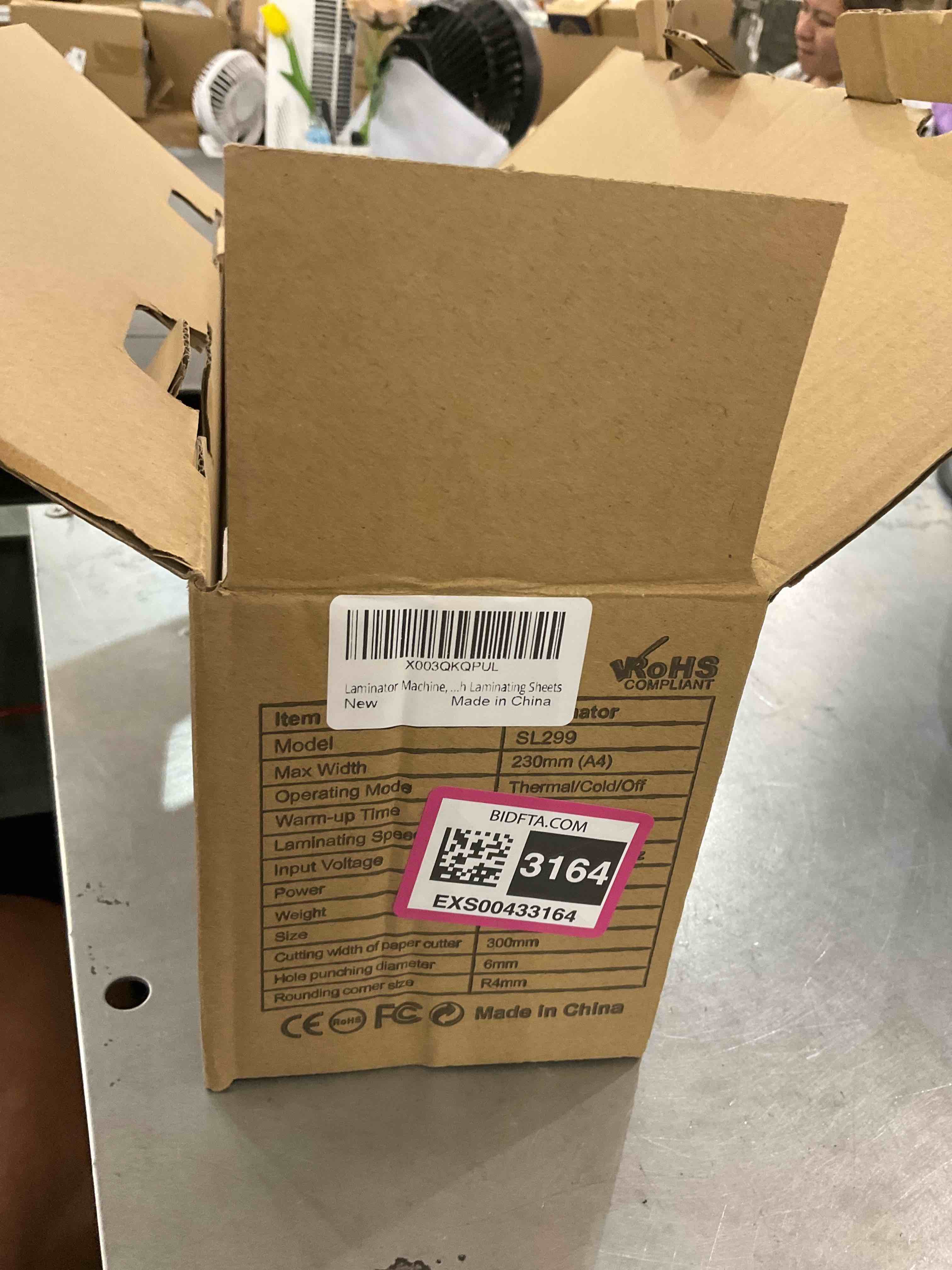 https://s3.amazonaws.com/lotting-images-prod/bidfta/EXS00433164_1694192634299.jpeg