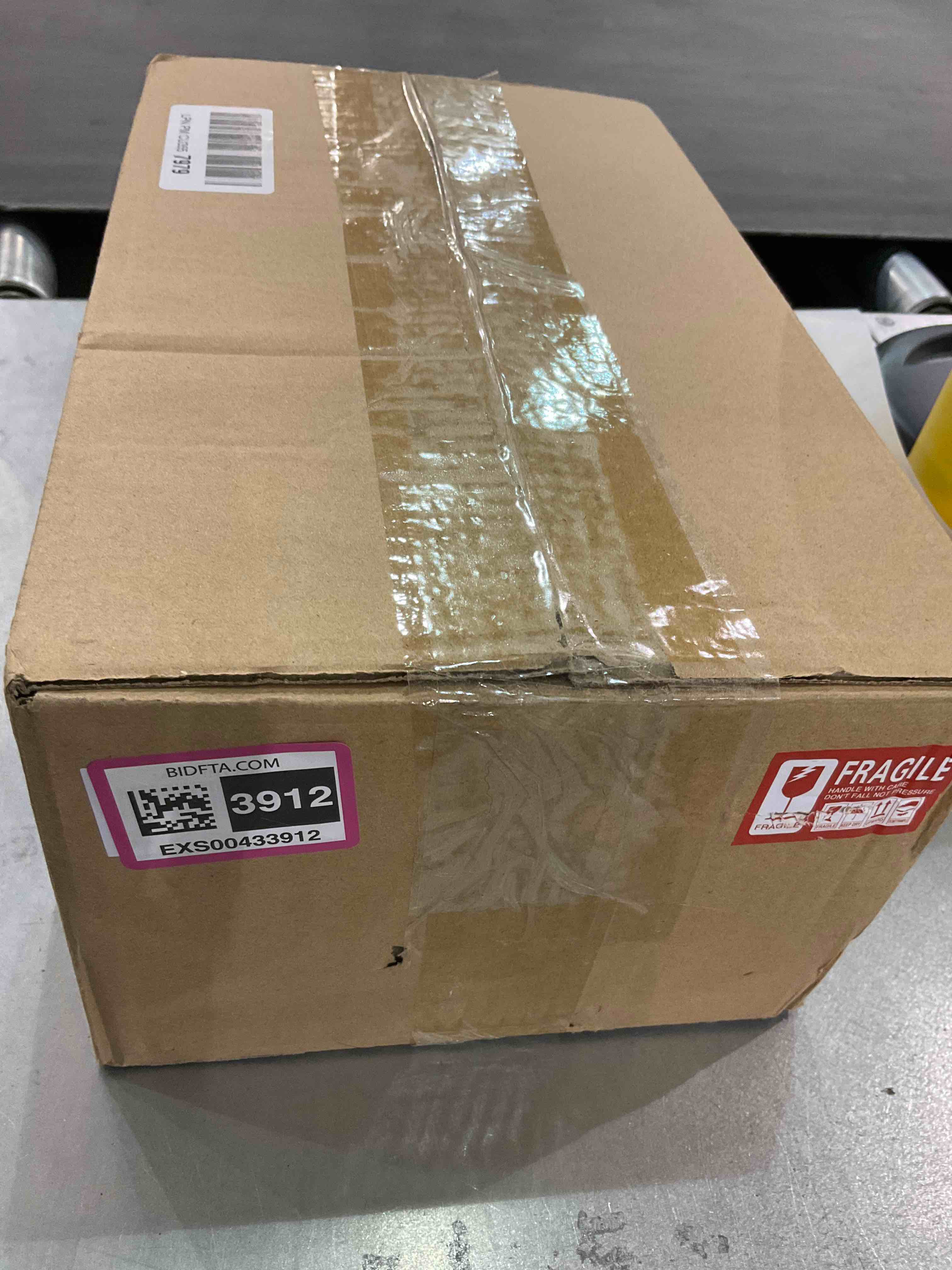 https://s3.amazonaws.com/lotting-images-prod/bidfta/EXS00433912_1693571062669.jpeg