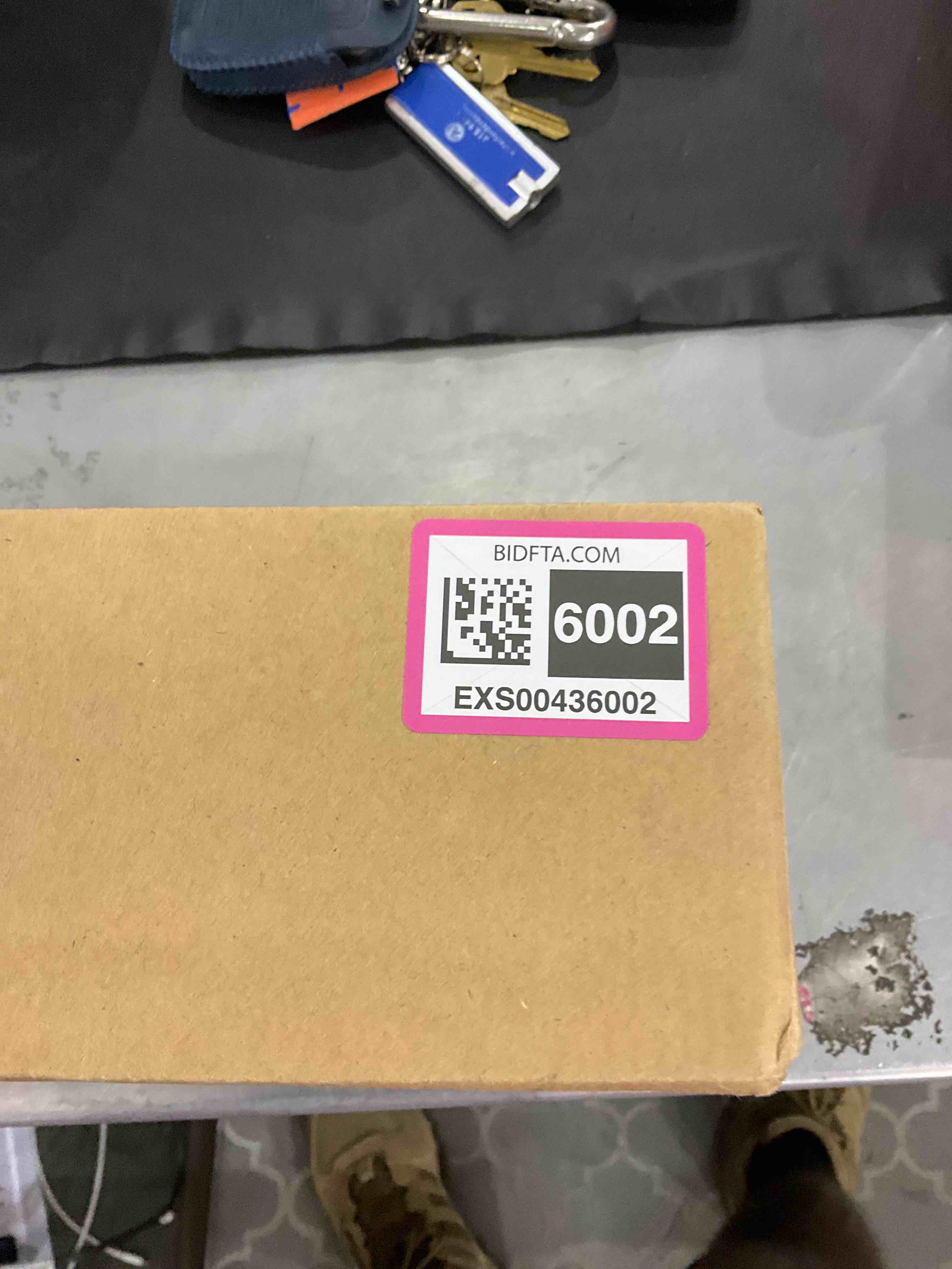 https://s3.amazonaws.com/lotting-images-prod/bidfta/EXS00436002_1693235875116.jpeg