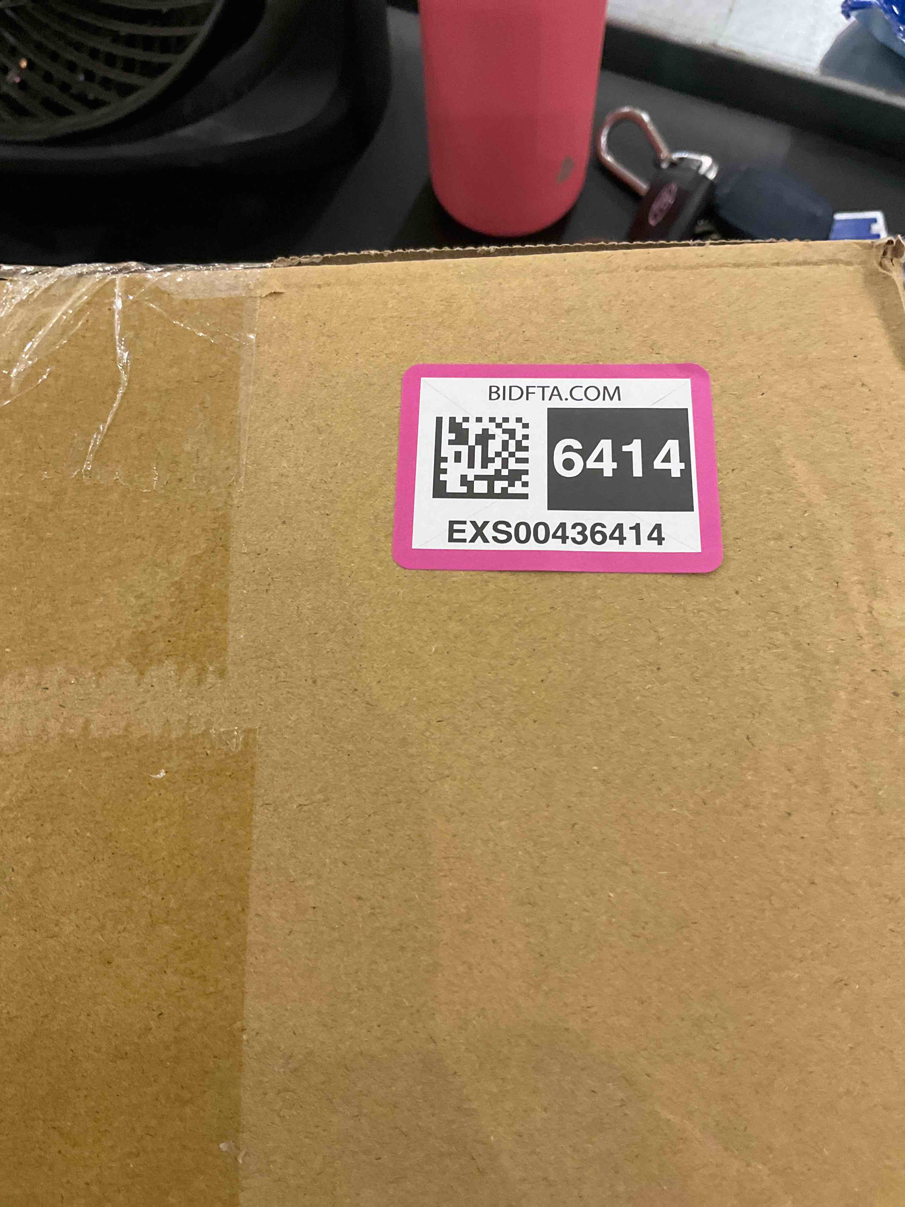 https://s3.amazonaws.com/lotting-images-prod/bidfta/EXS00436414_1693924310941.jpeg