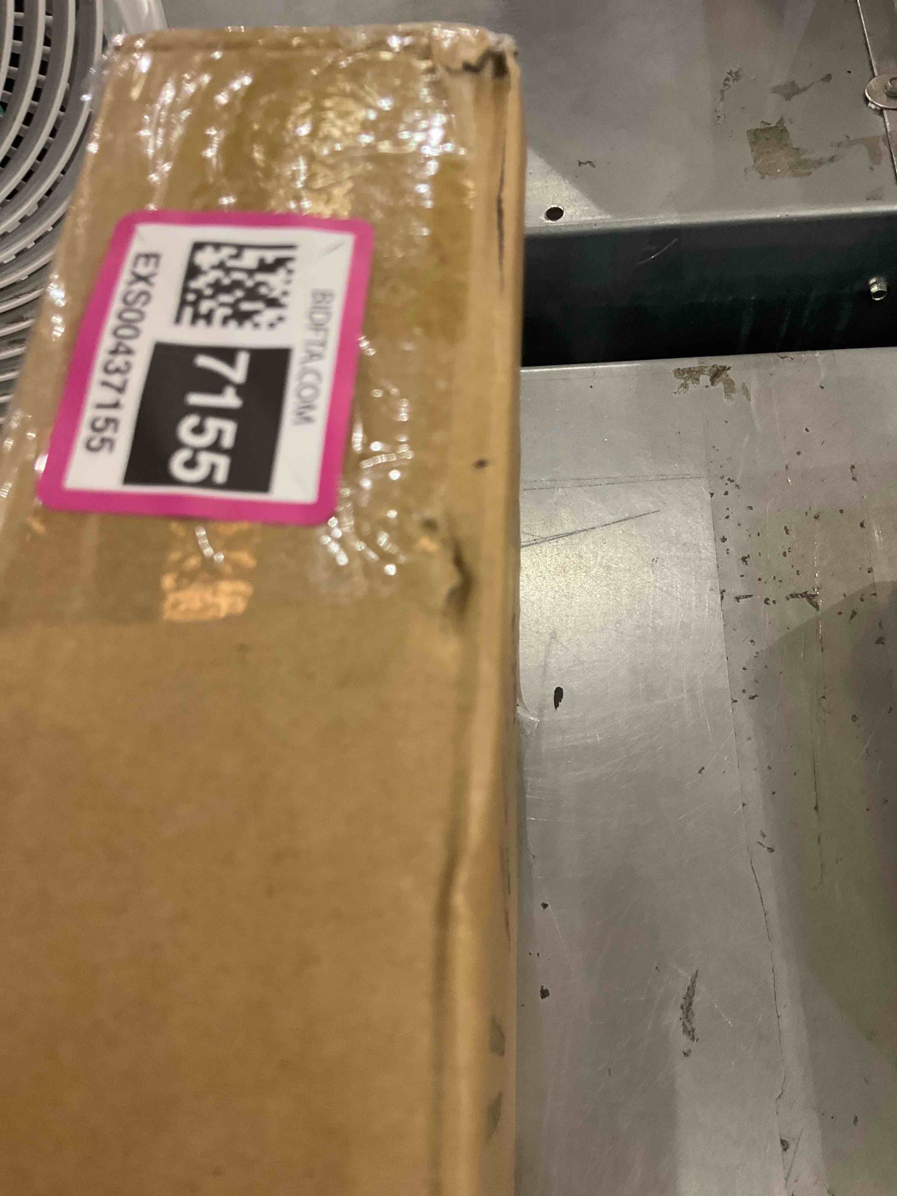 https://s3.amazonaws.com/lotting-images-prod/bidfta/EXS00437155_1693587785332.jpeg