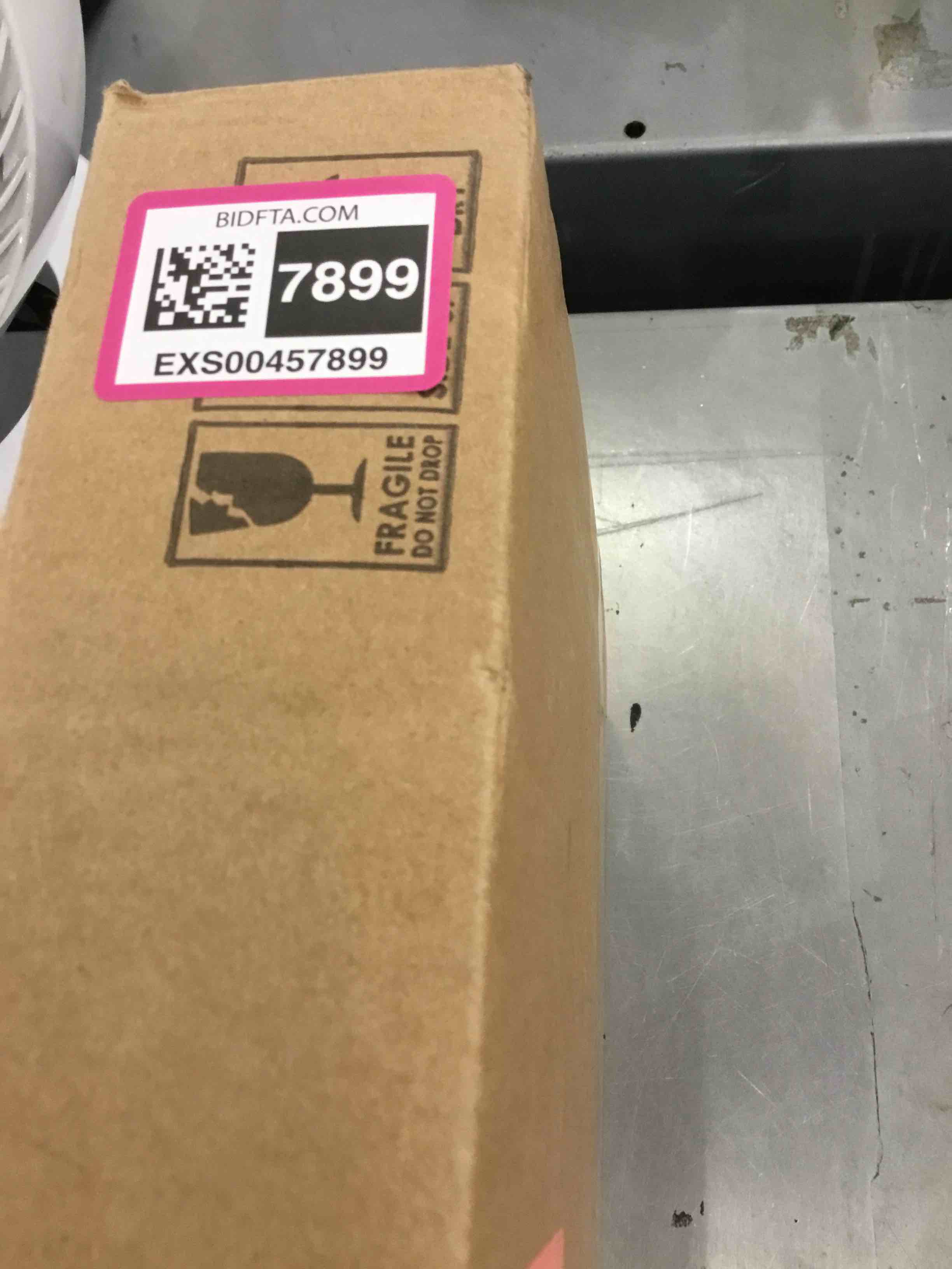 https://s3.amazonaws.com/lotting-images-prod/bidfta/EXS00457899_1692113900438.jpeg
