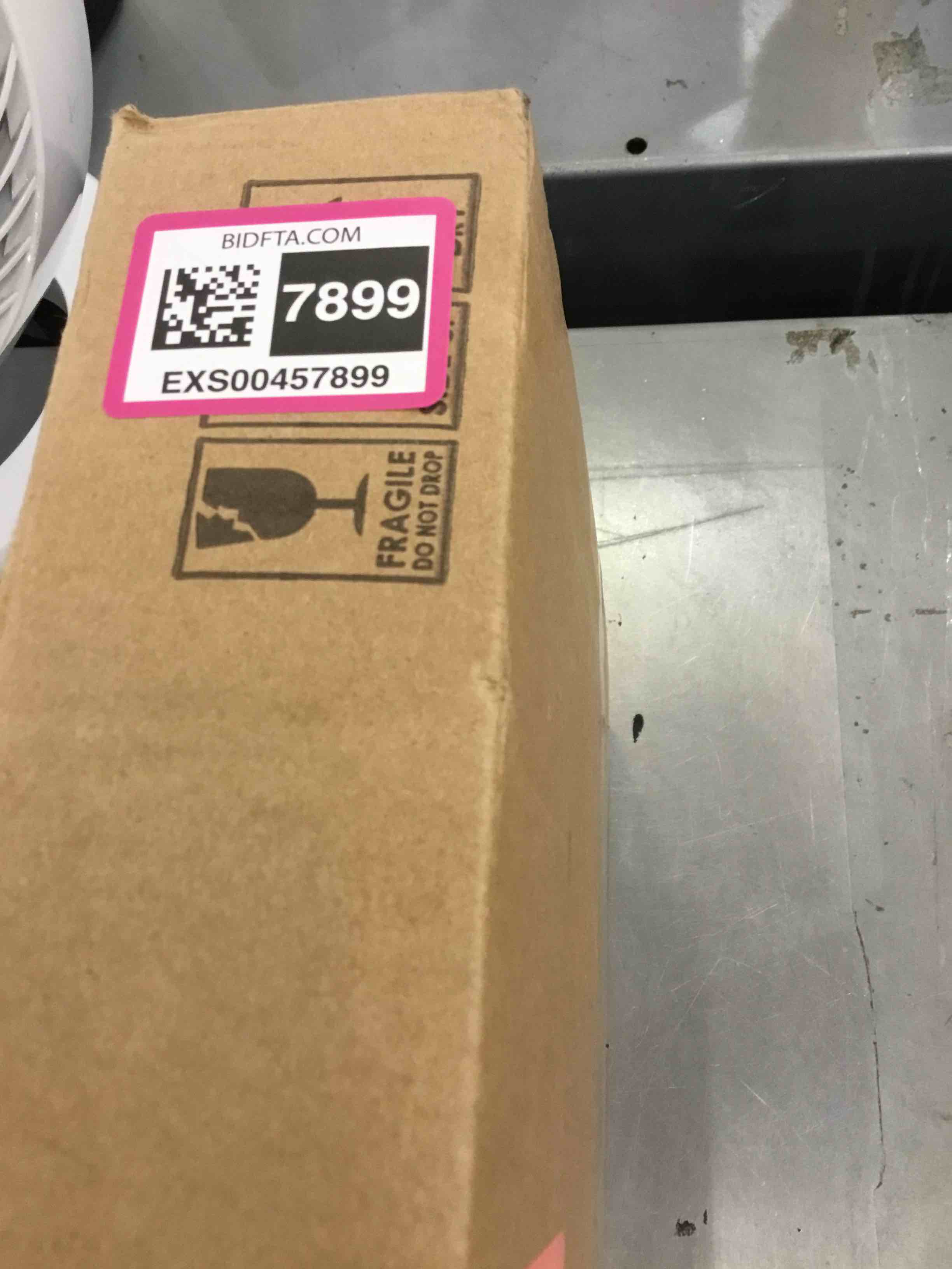 https://s3.amazonaws.com/lotting-images-prod/bidfta/EXS00457899_1692113901905.jpeg