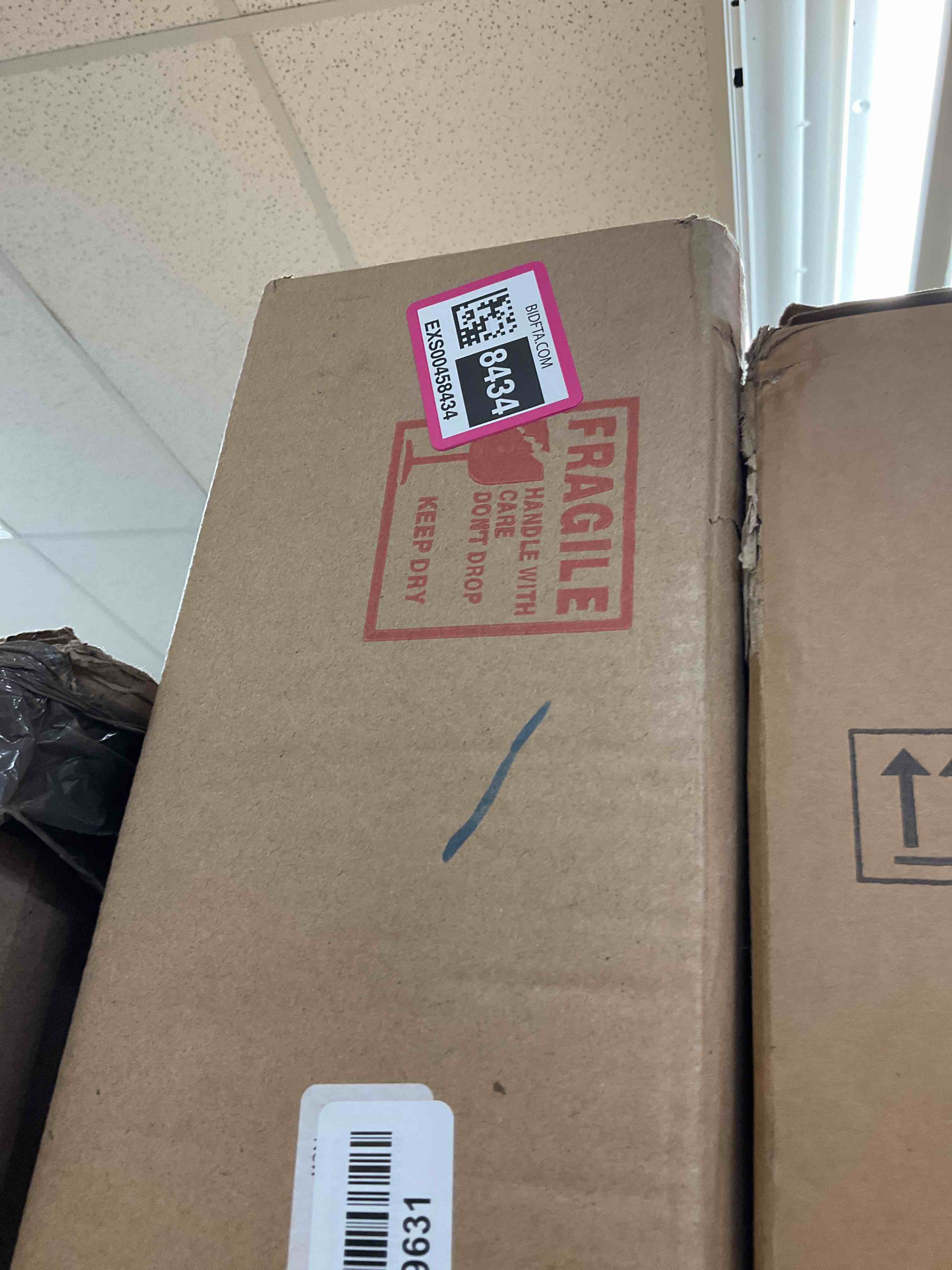 https://s3.amazonaws.com/lotting-images-prod/bidfta/EXS00458434_1694627031493.jpeg