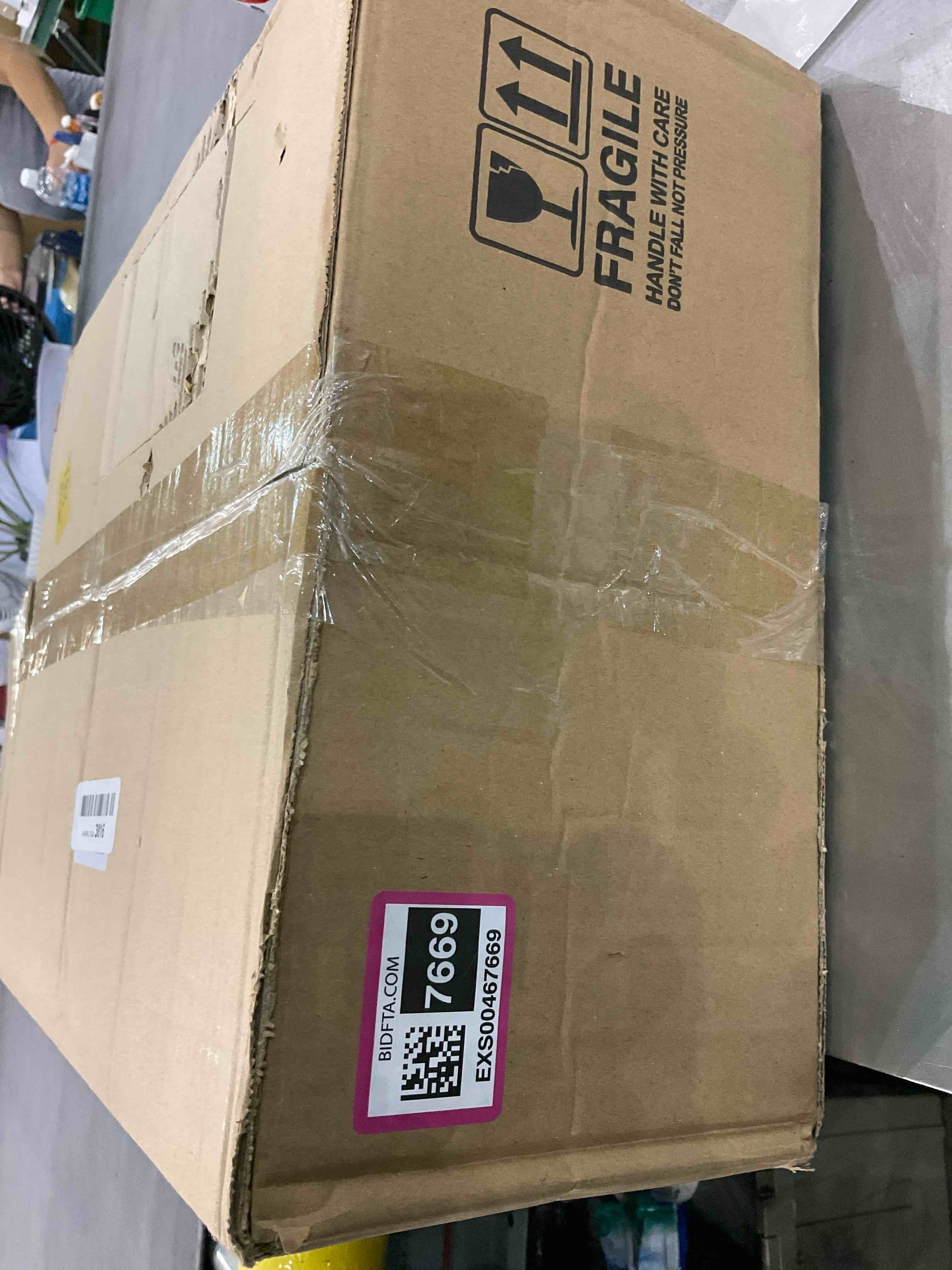 https://s3.amazonaws.com/lotting-images-prod/bidfta/EXS00467669_1695641191088.jpeg