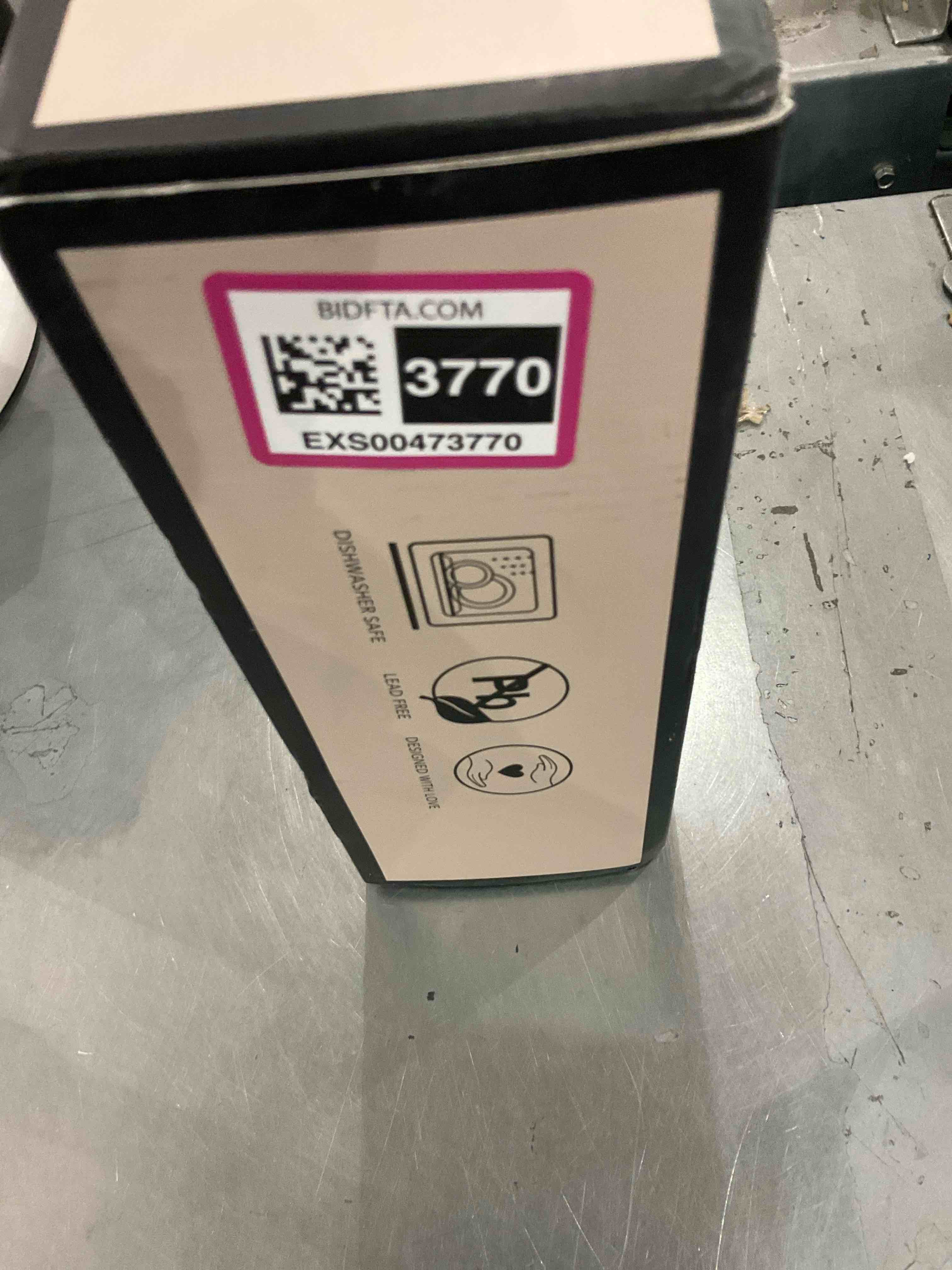 https://s3.amazonaws.com/lotting-images-prod/bidfta/EXS00473770_1696862651946.jpeg