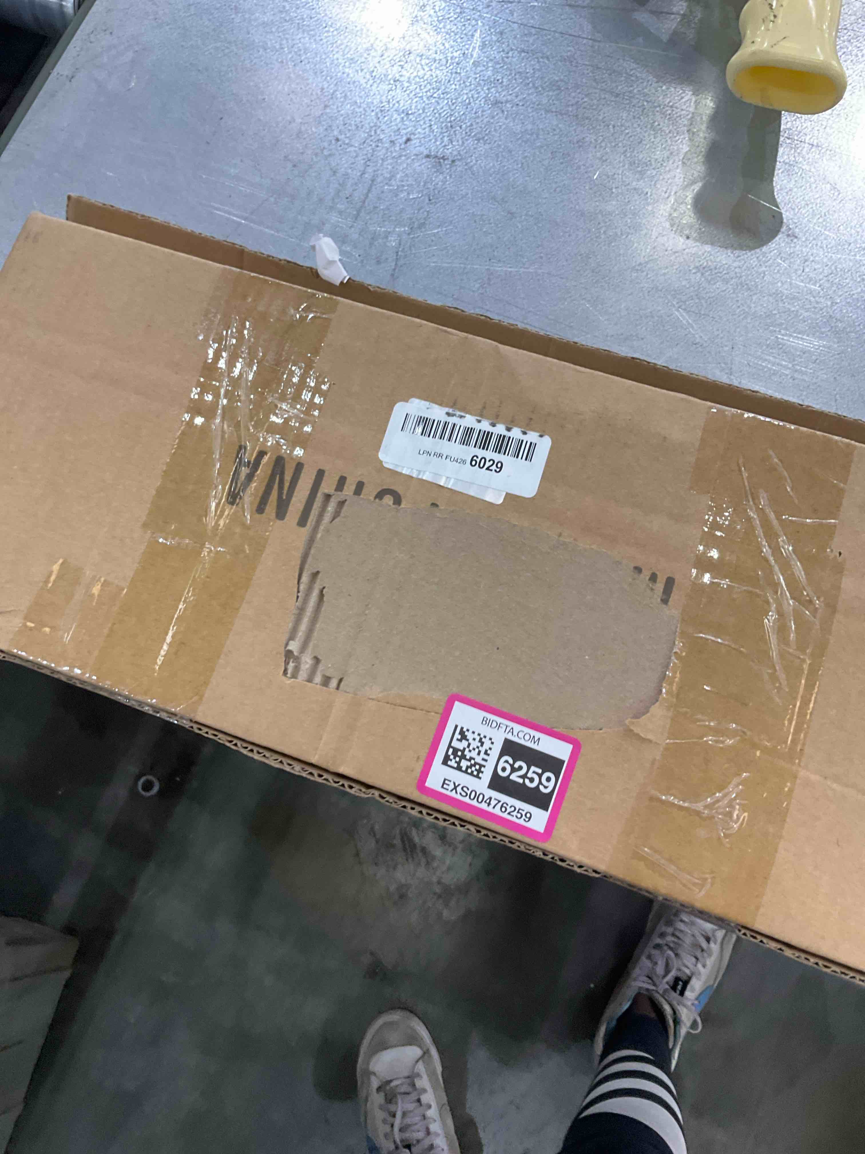 https://s3.amazonaws.com/lotting-images-prod/bidfta/EXS00476259_1695821567139.jpeg