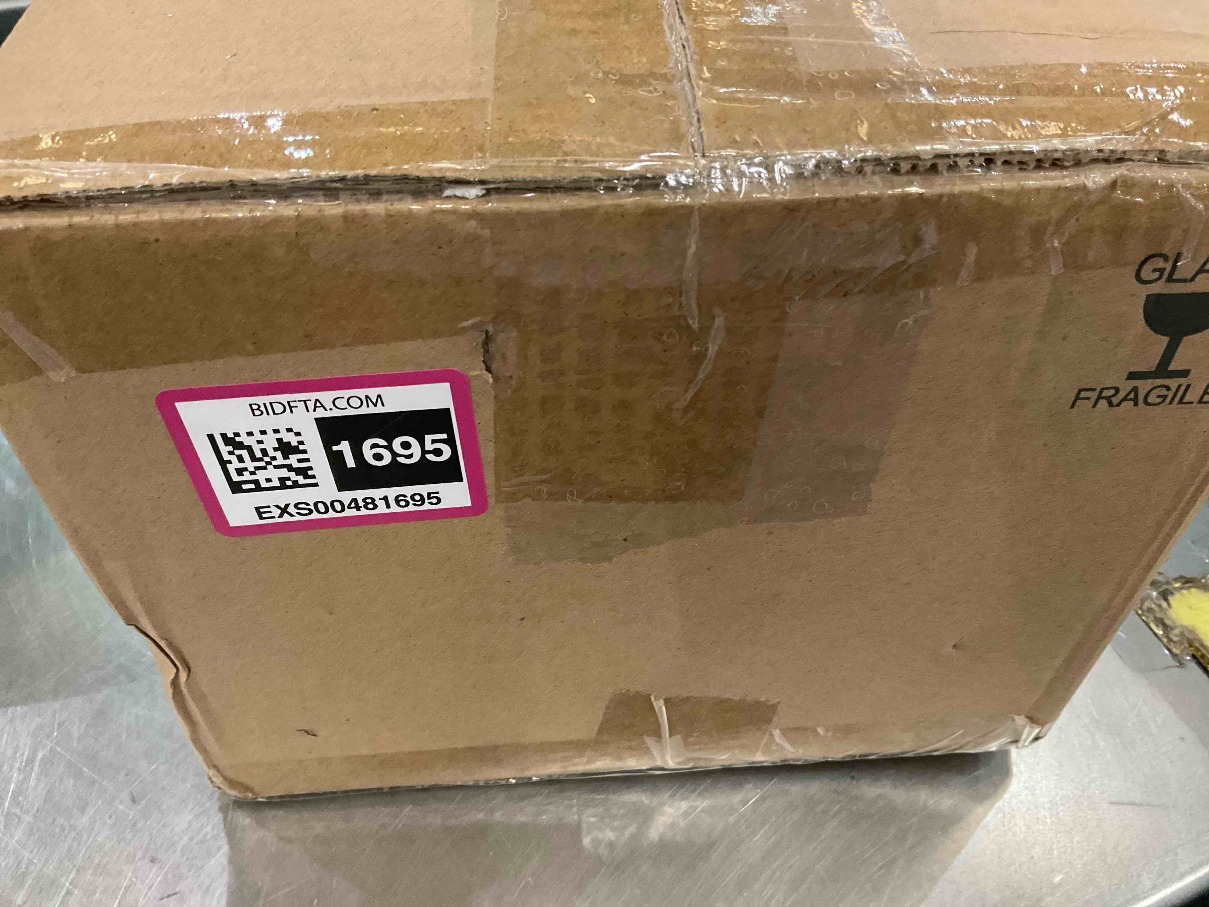 https://s3.amazonaws.com/lotting-images-prod/bidfta/EXS00481695_1695738711266.jpeg