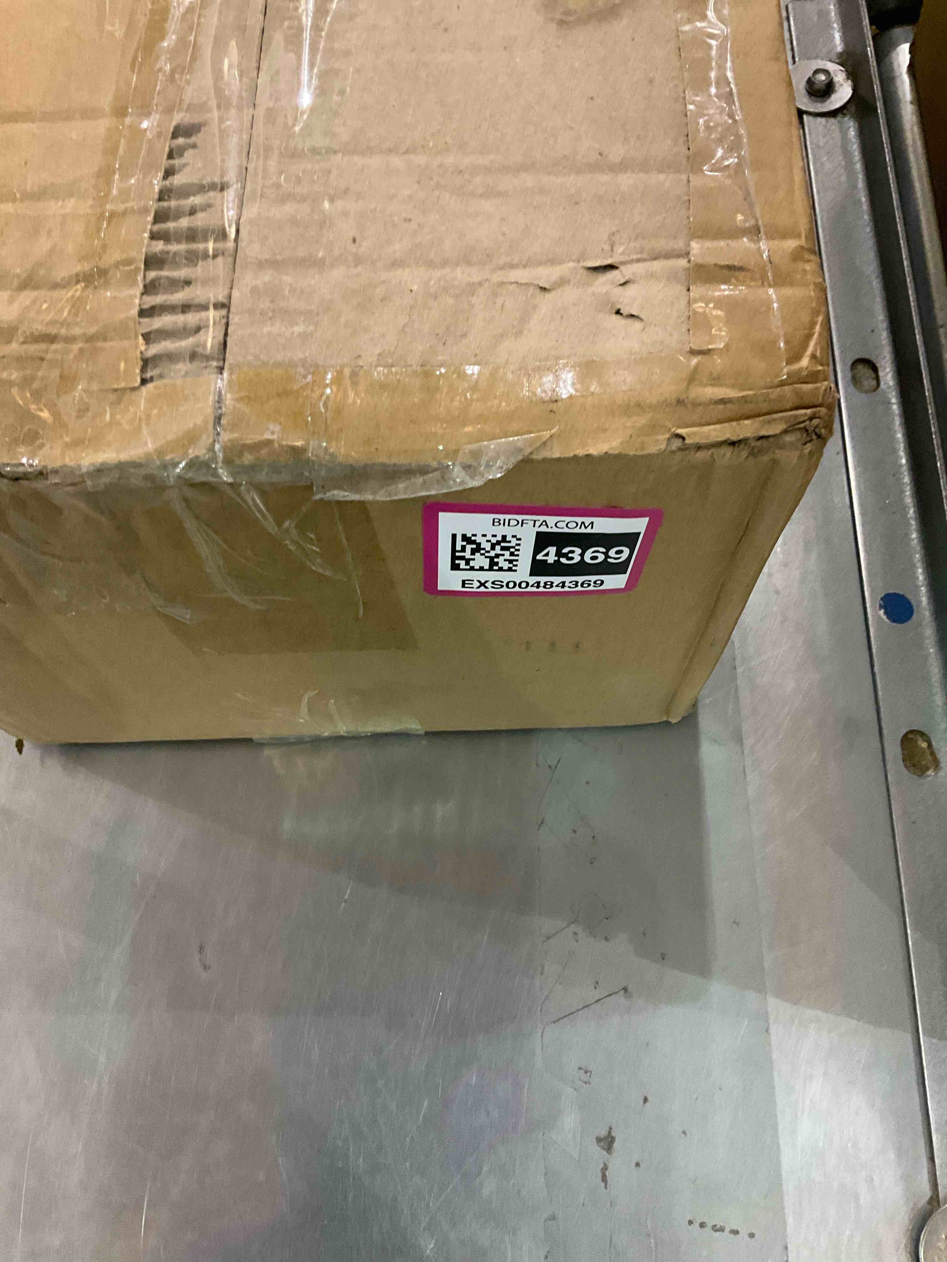 https://s3.amazonaws.com/lotting-images-prod/bidfta/EXS00484369_1695821338415.jpeg