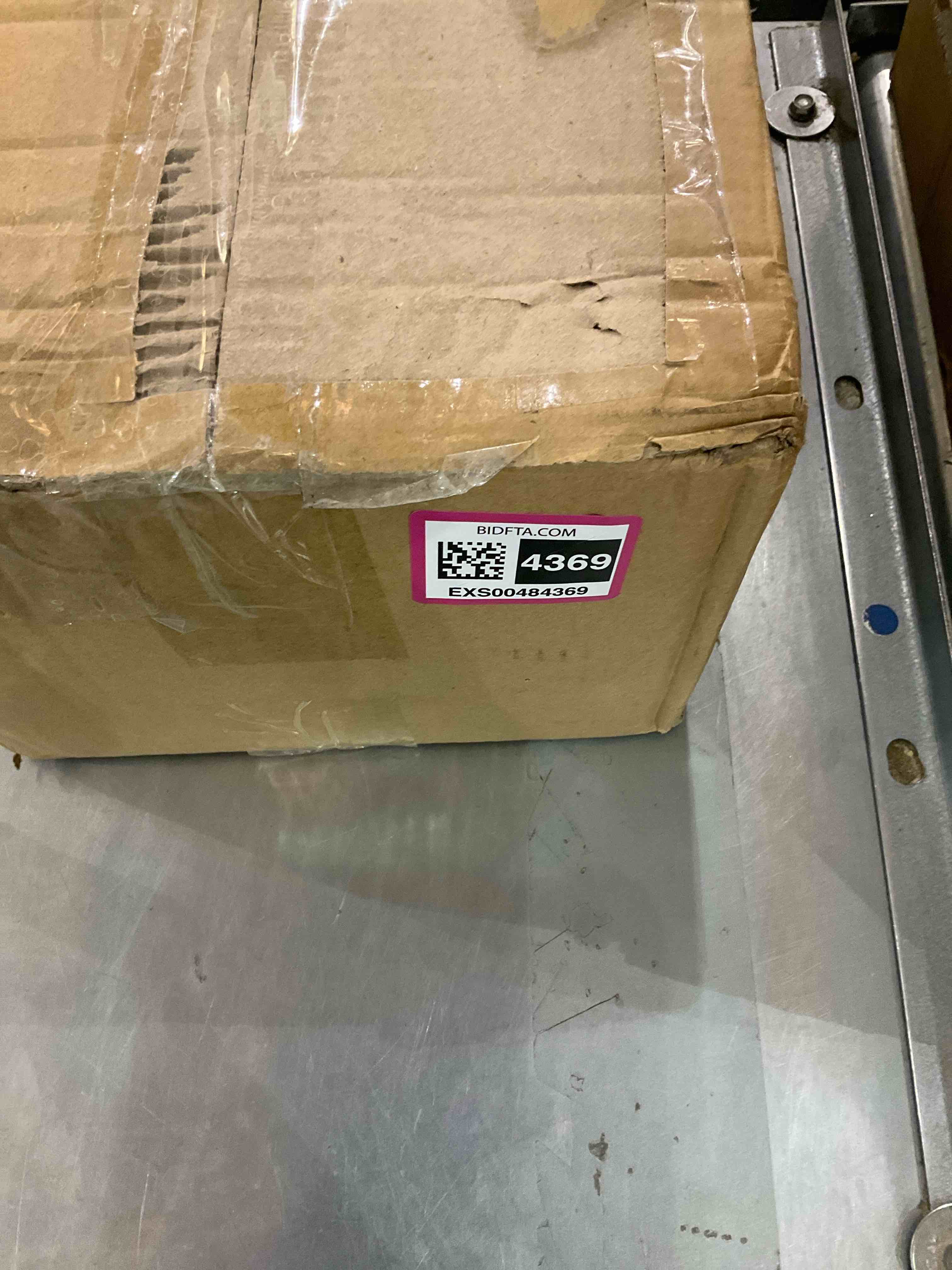 https://s3.amazonaws.com/lotting-images-prod/bidfta/EXS00484369_1695821339649.jpeg