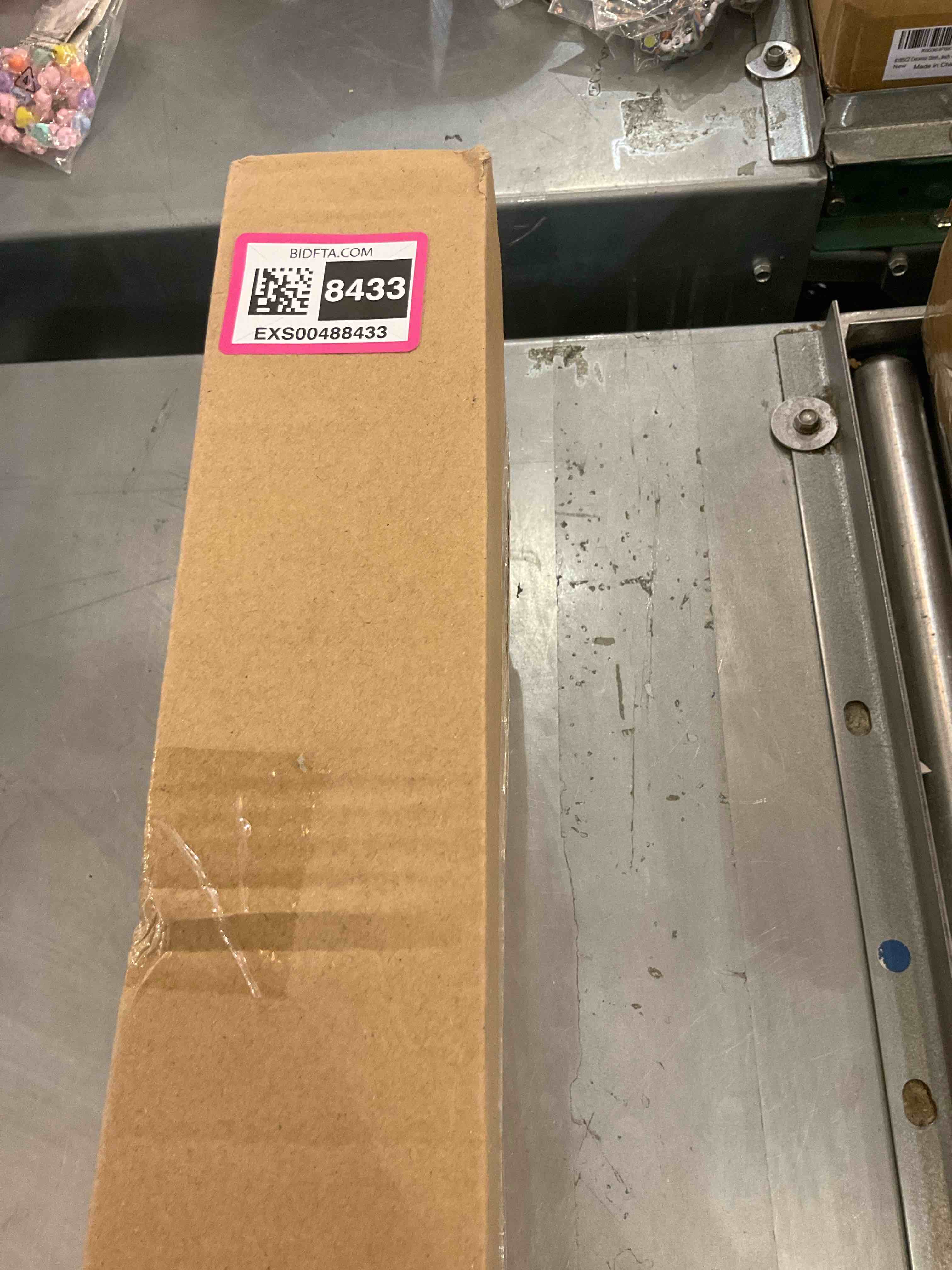 https://s3.amazonaws.com/lotting-images-prod/bidfta/EXS00488433_1695321382093.jpeg