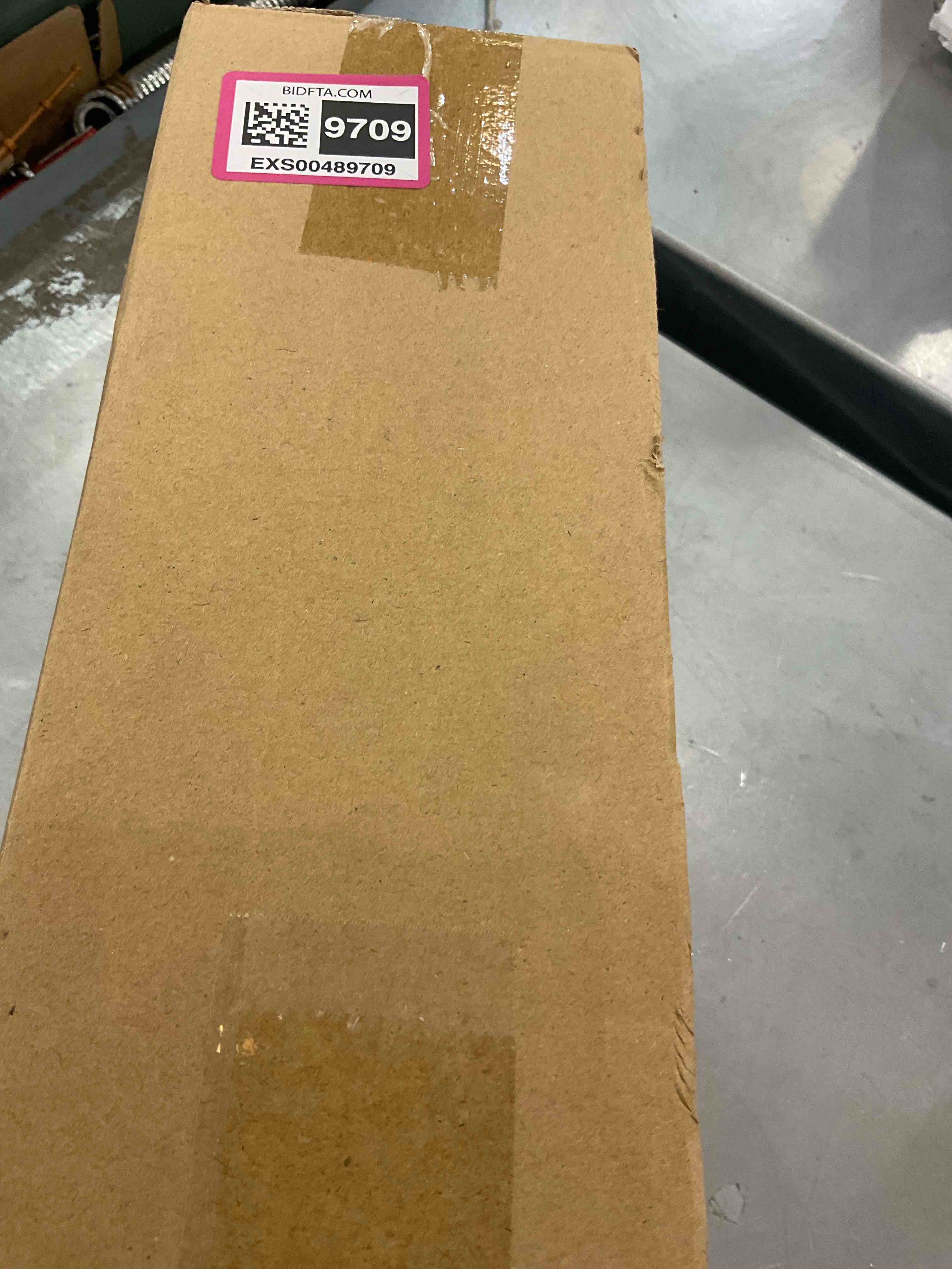 https://s3.amazonaws.com/lotting-images-prod/bidfta/EXS00489709_1695738623832.jpeg