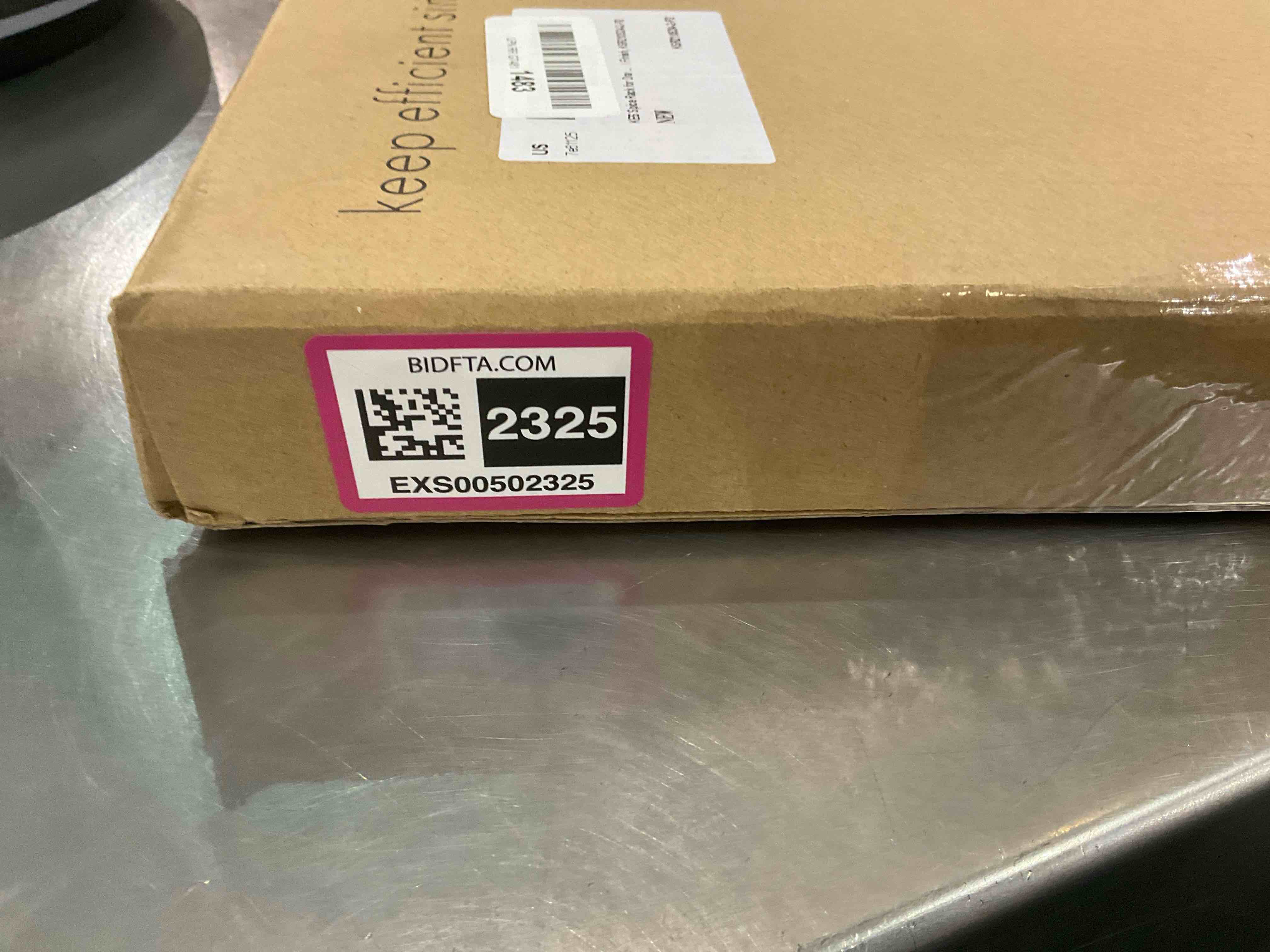 https://s3.amazonaws.com/lotting-images-prod/bidfta/EXS00502325_1698328929181.jpeg