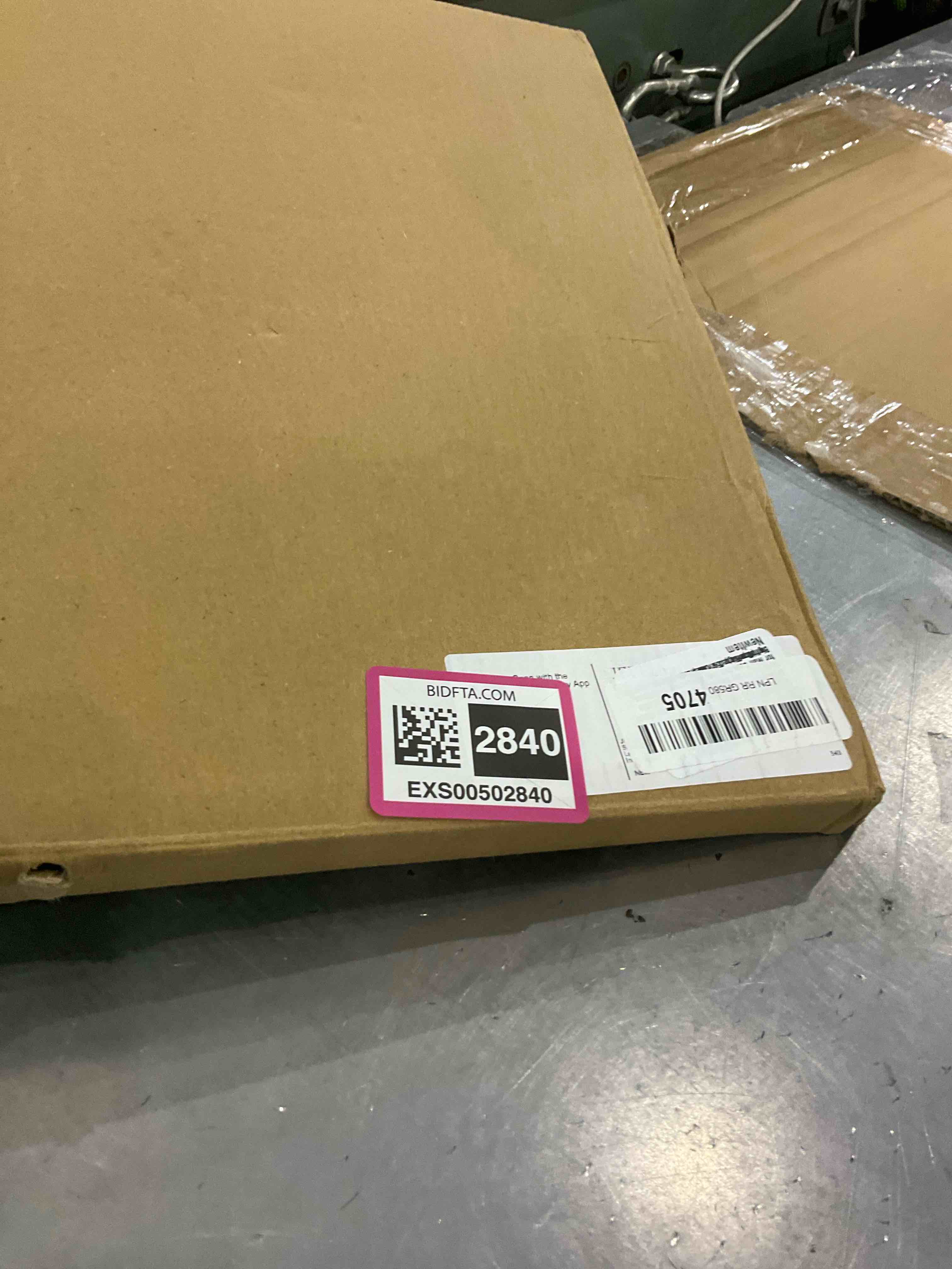 https://s3.amazonaws.com/lotting-images-prod/bidfta/EXS00502840_1698234955646.jpeg