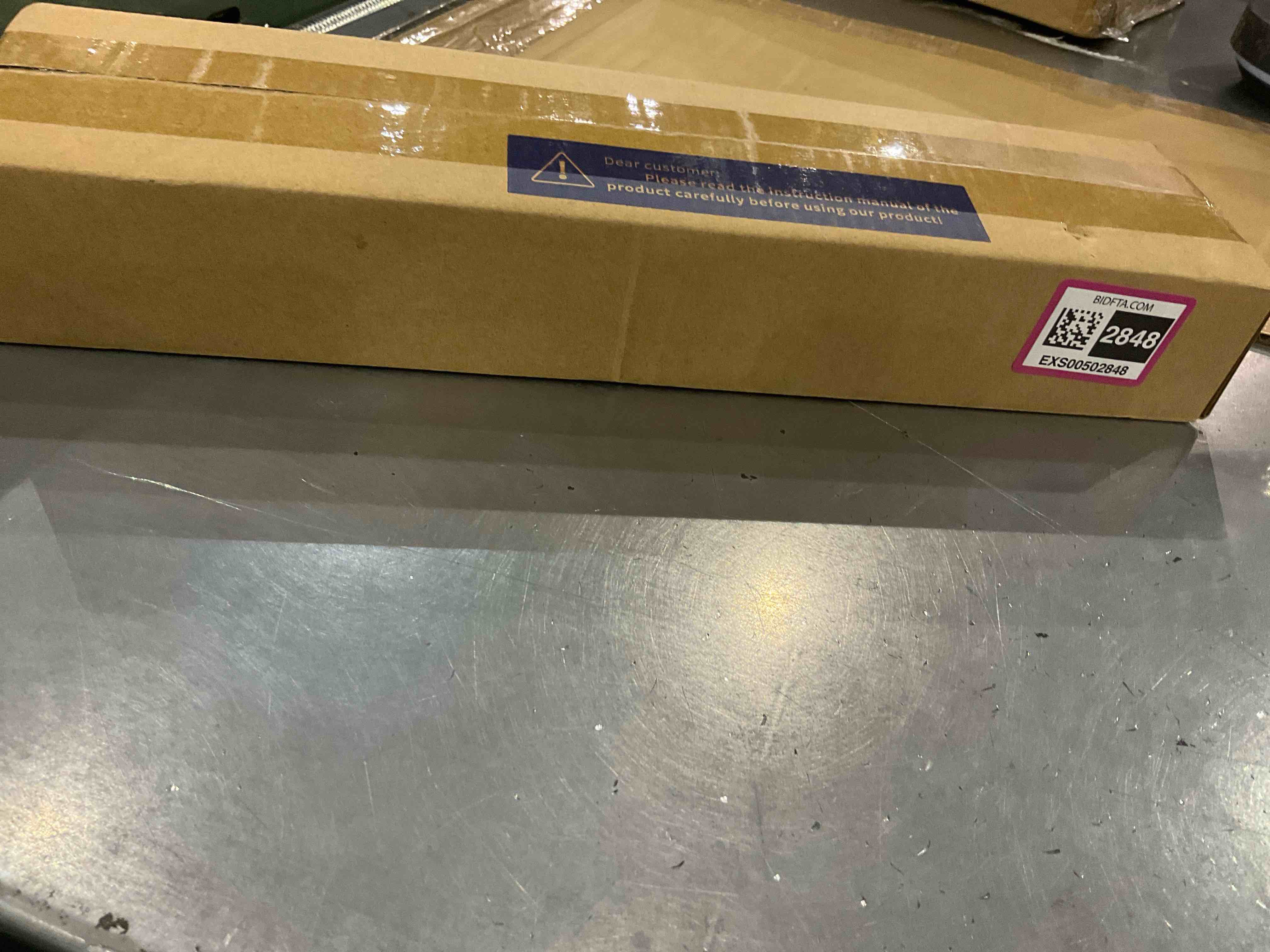 https://s3.amazonaws.com/lotting-images-prod/bidfta/EXS00502848_1698235986874.jpeg