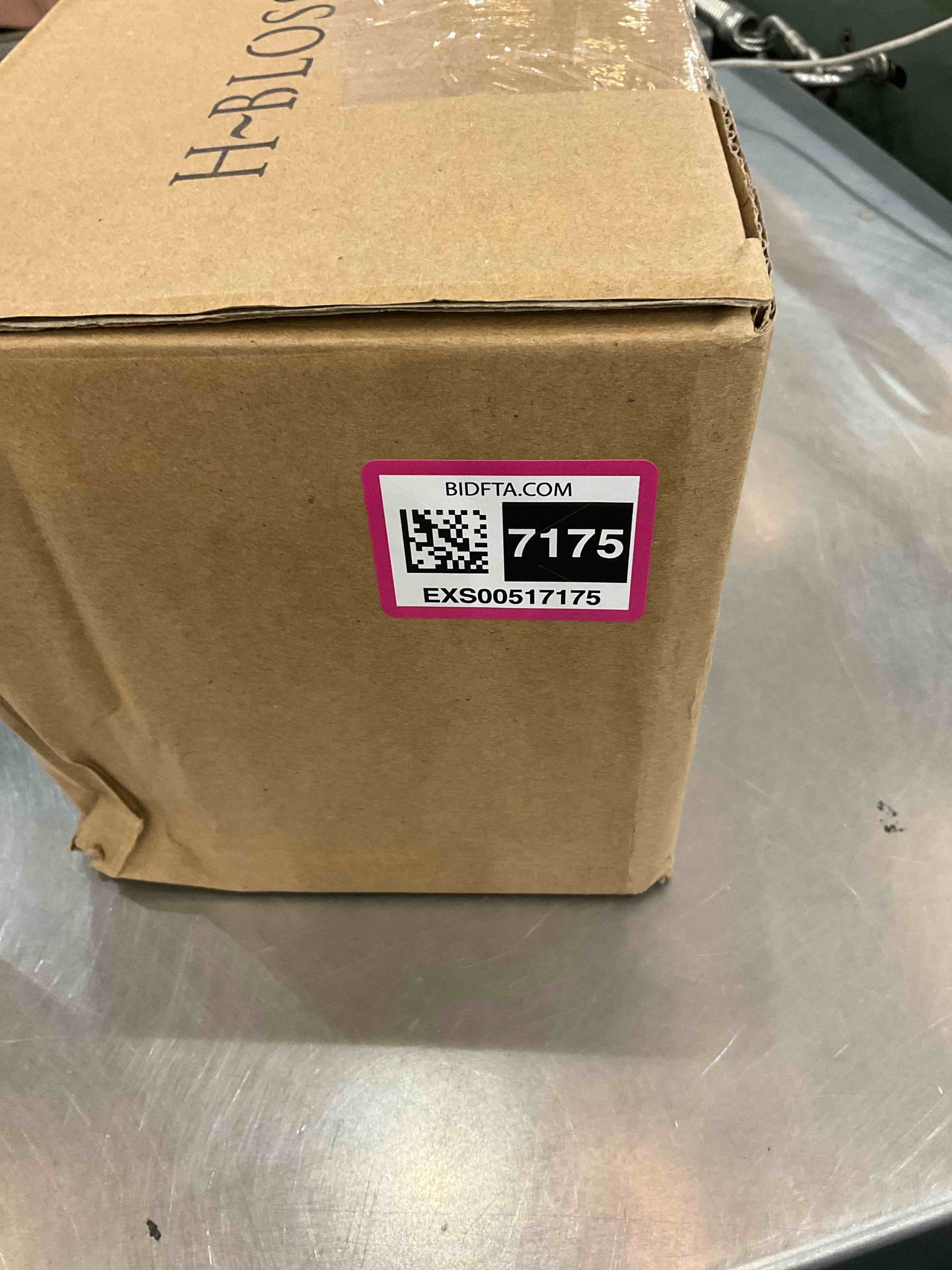 https://s3.amazonaws.com/lotting-images-prod/bidfta/EXS00517175_1696441312985.jpeg
