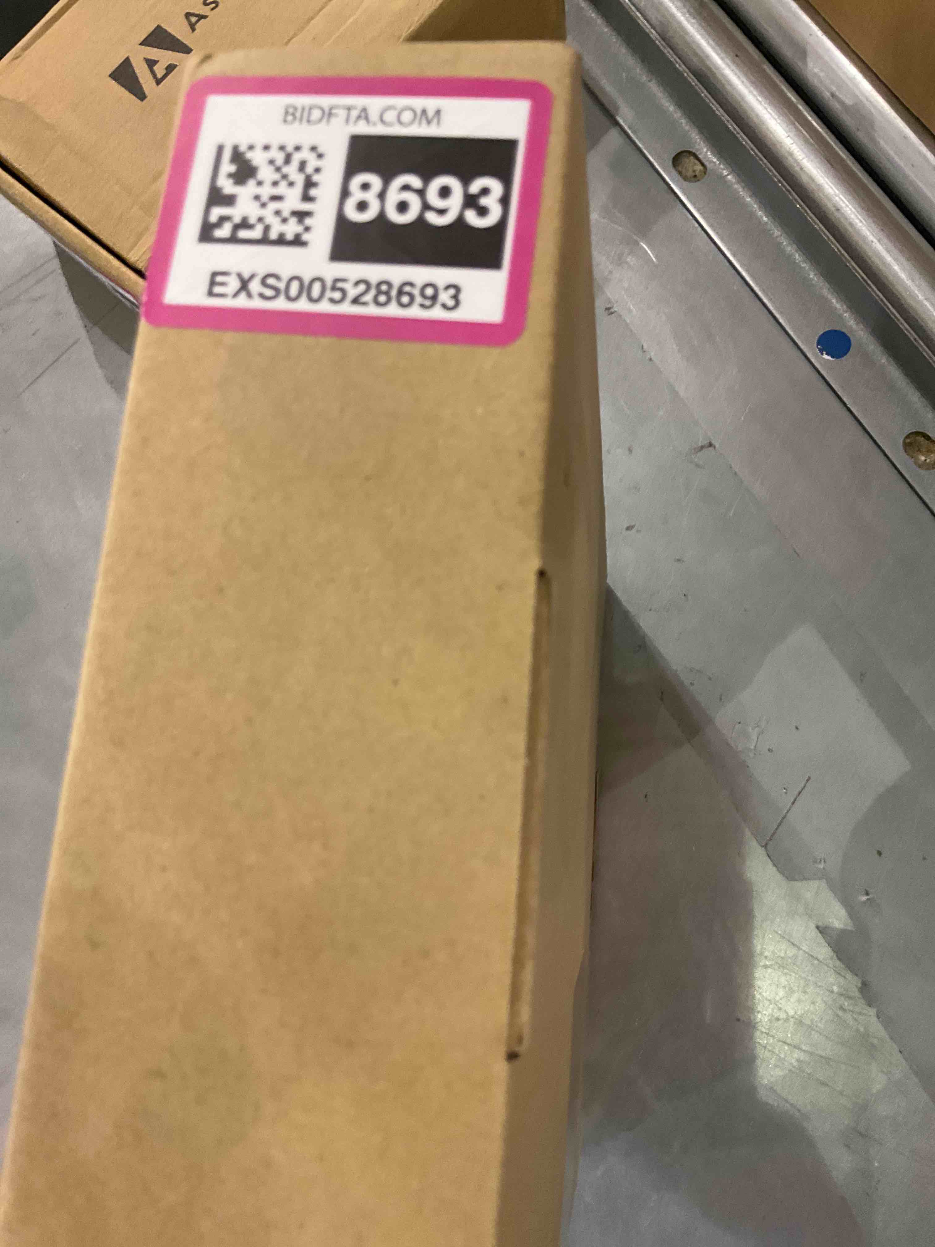https://s3.amazonaws.com/lotting-images-prod/bidfta/EXS00528693_1695036187775.jpeg