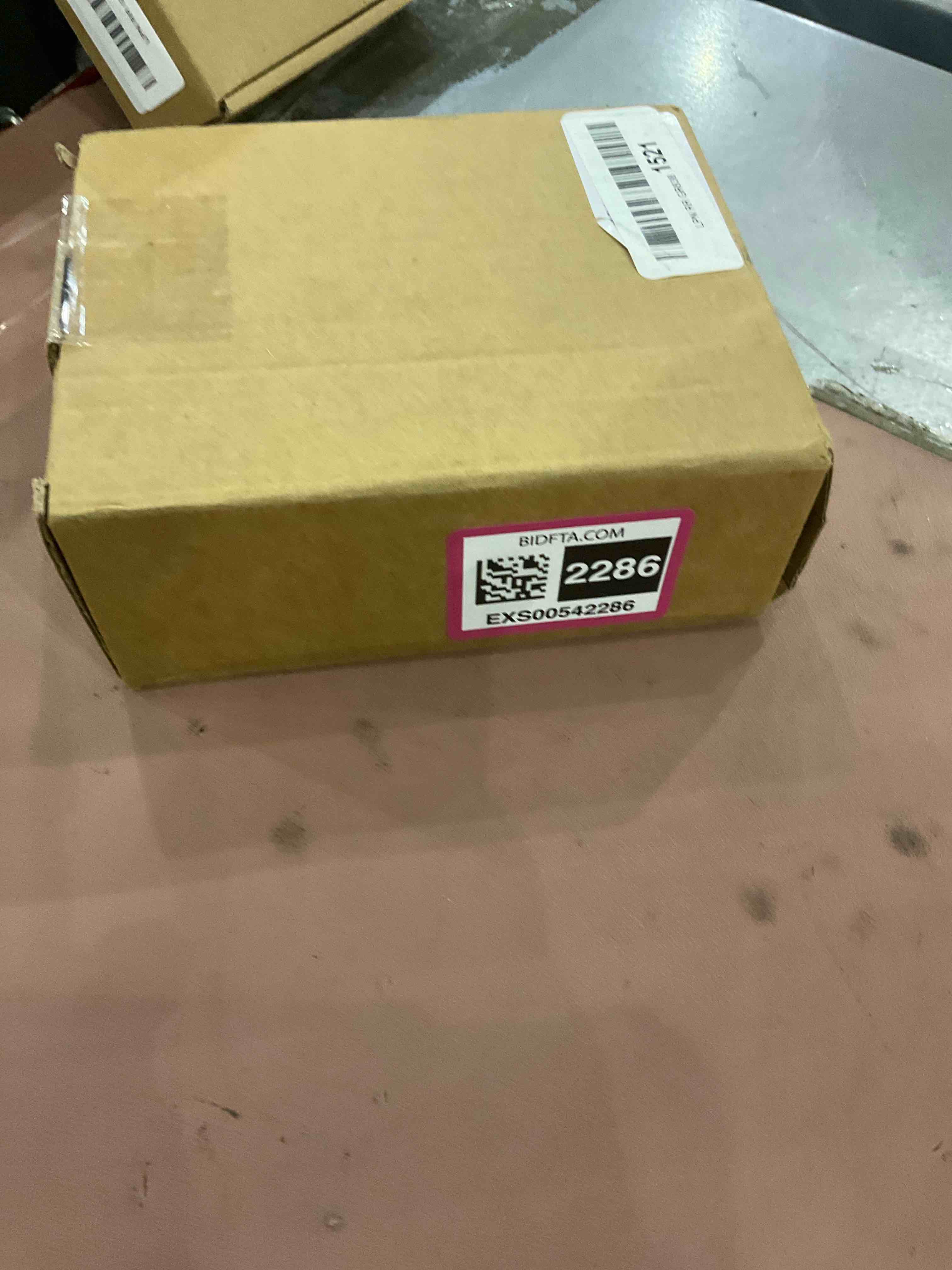 https://s3.amazonaws.com/lotting-images-prod/bidfta/EXS00542286_1696594463399.jpeg