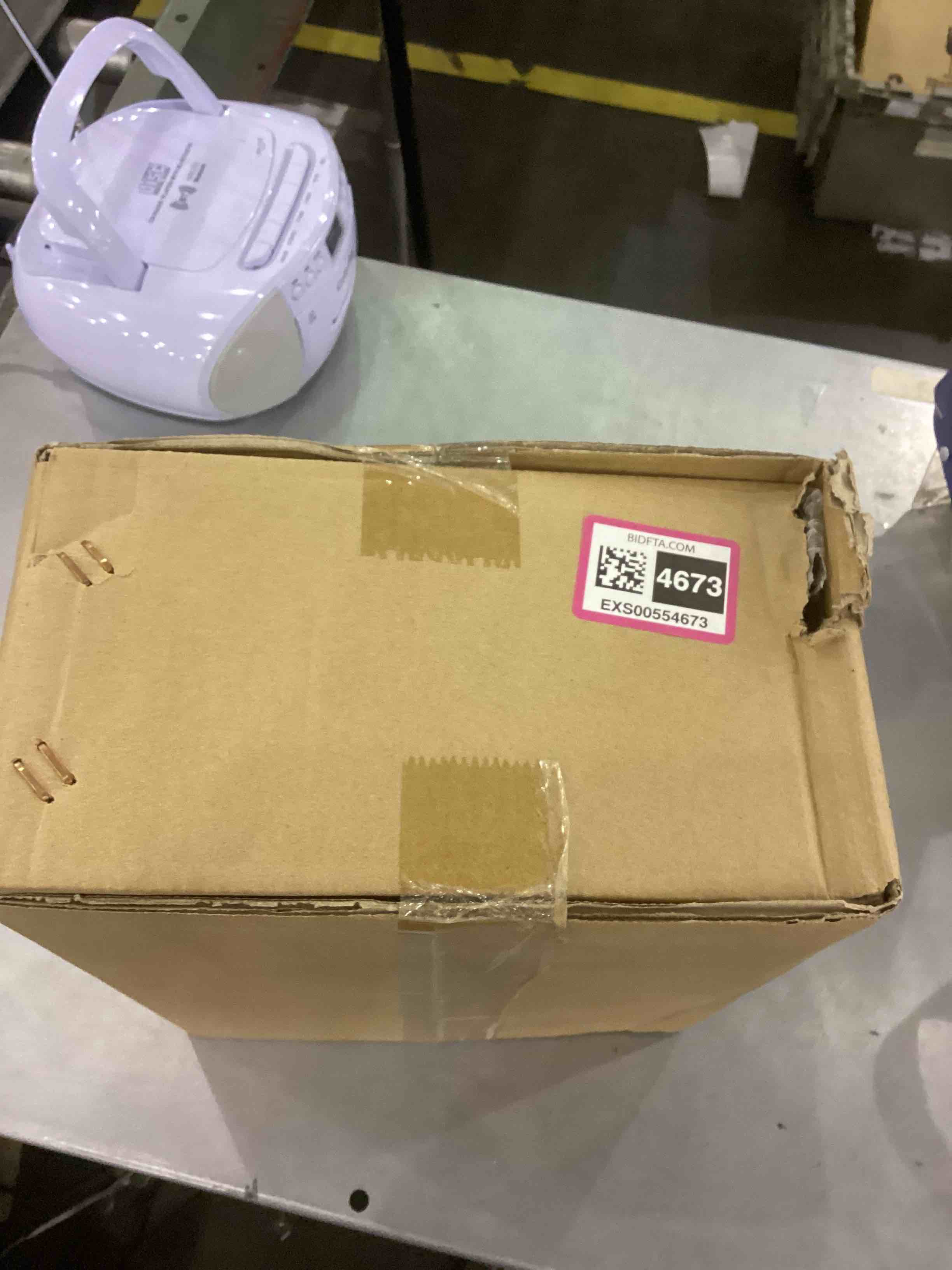 https://s3.amazonaws.com/lotting-images-prod/bidfta/EXS00554673_1693914413832.jpeg