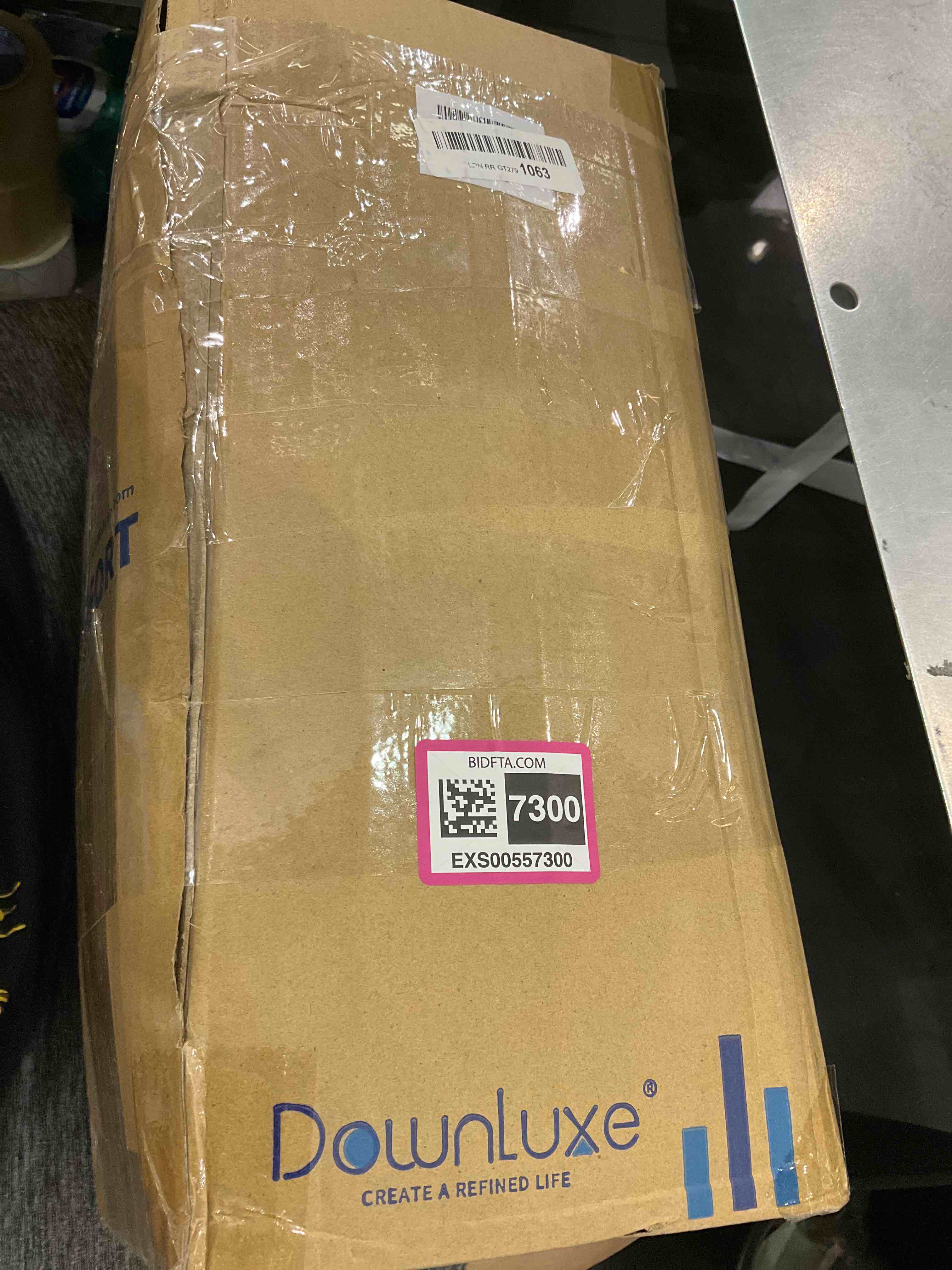 https://s3.amazonaws.com/lotting-images-prod/bidfta/EXS00557300_1694020718848.jpeg