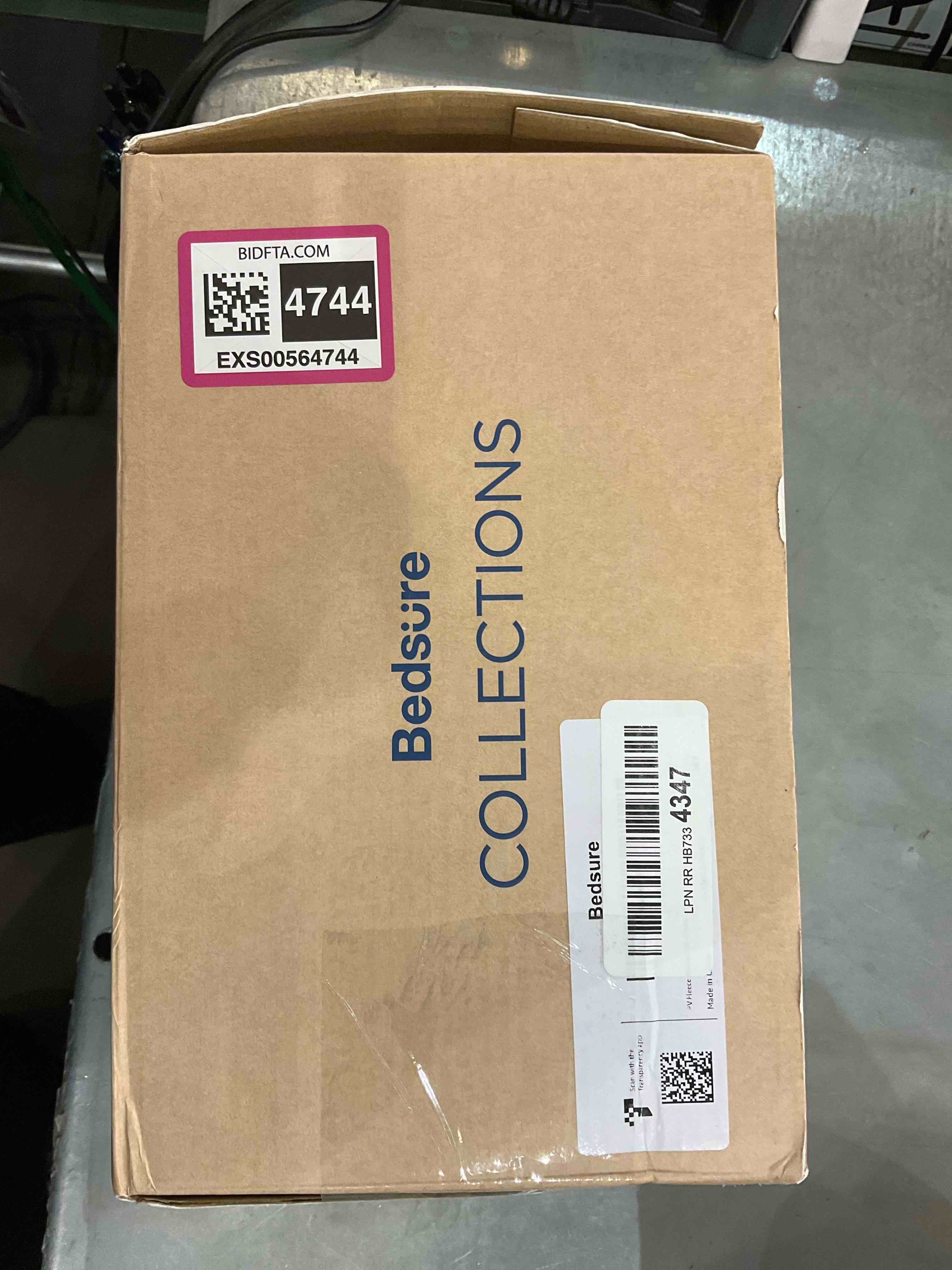https://s3.amazonaws.com/lotting-images-prod/bidfta/EXS00564744_1700162862979.jpeg