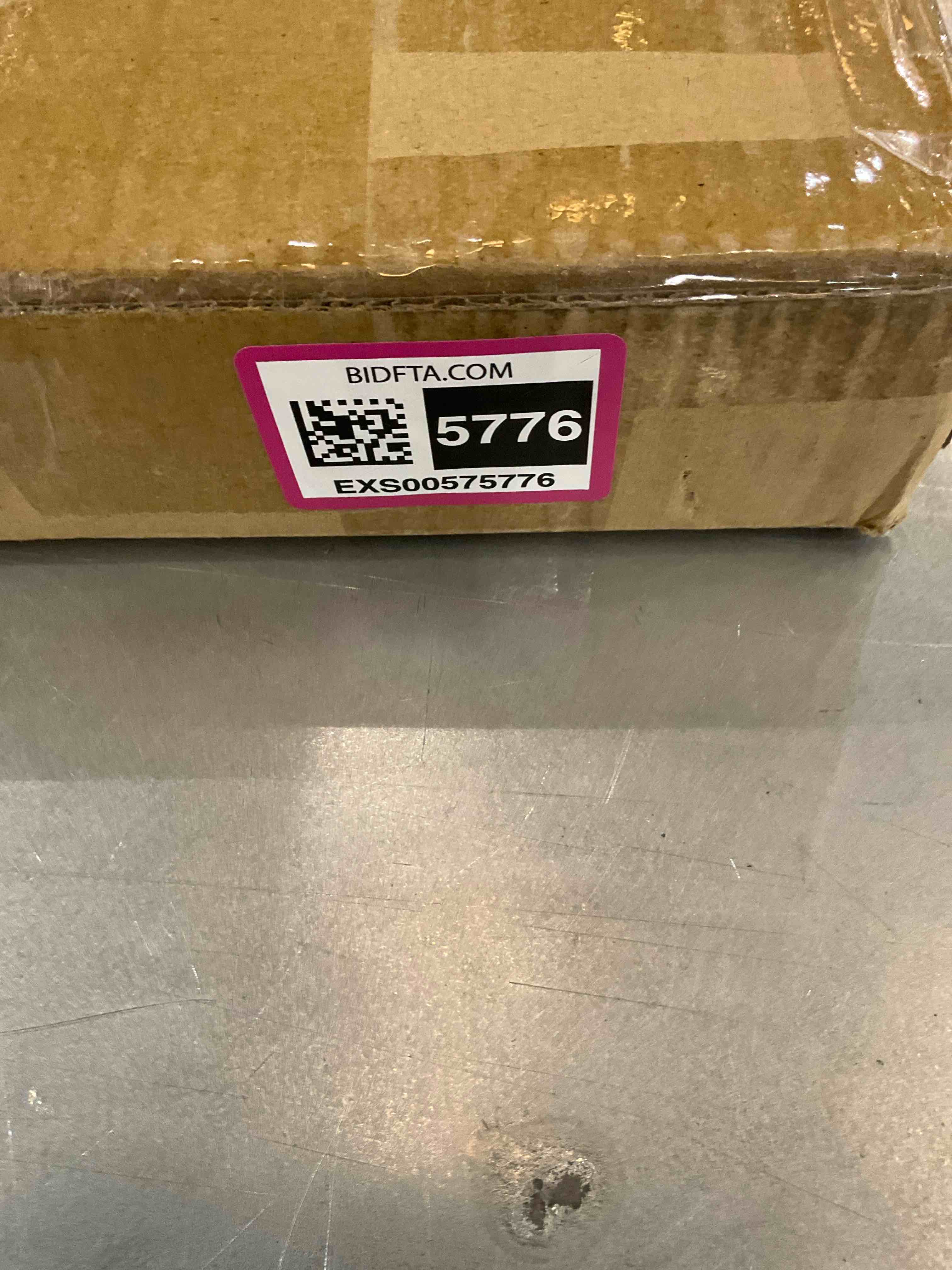 https://s3.amazonaws.com/lotting-images-prod/bidfta/EXS00575776_1695660562816.jpeg