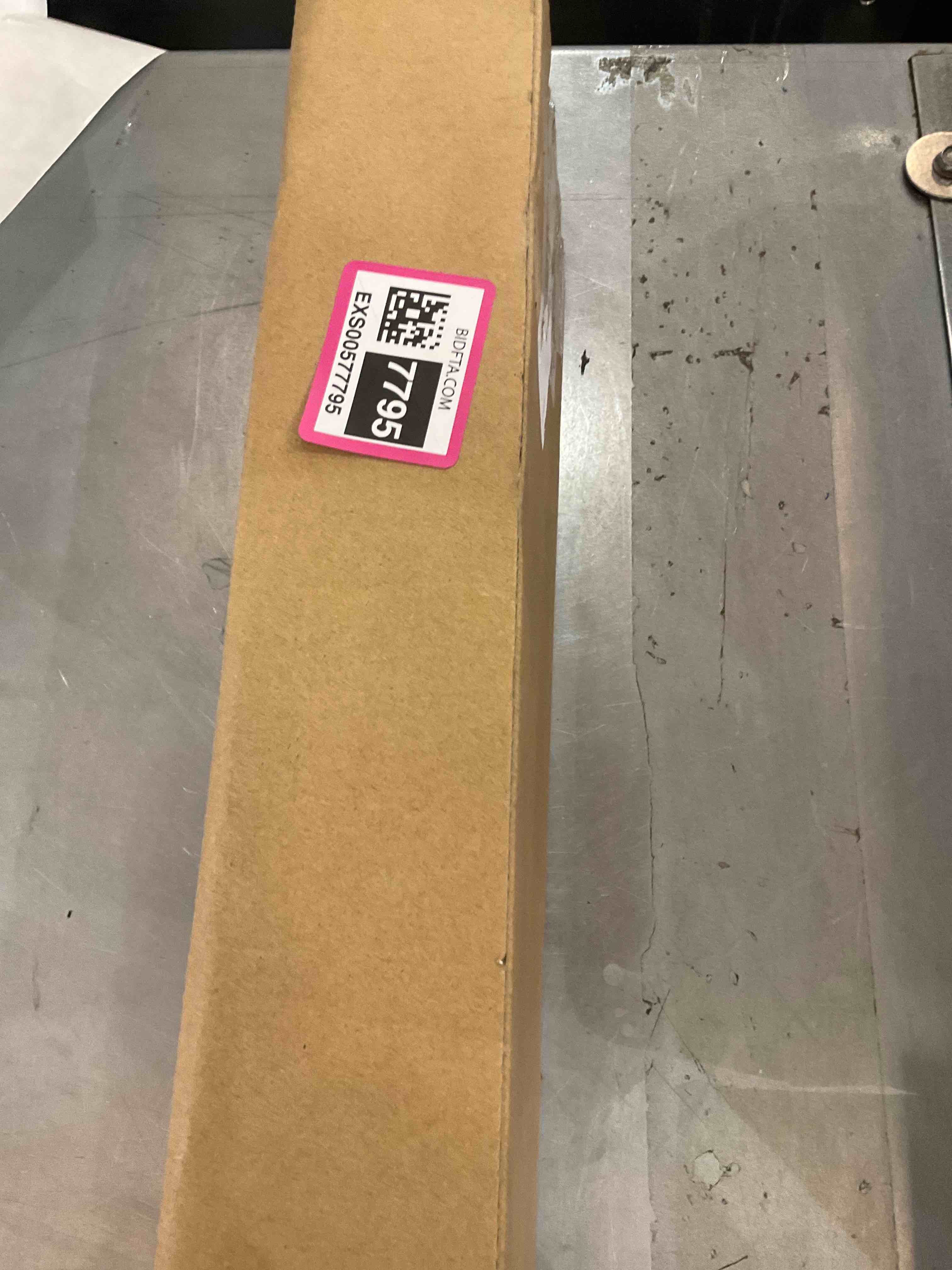 https://s3.amazonaws.com/lotting-images-prod/bidfta/EXS00577795_1694199591765.jpeg