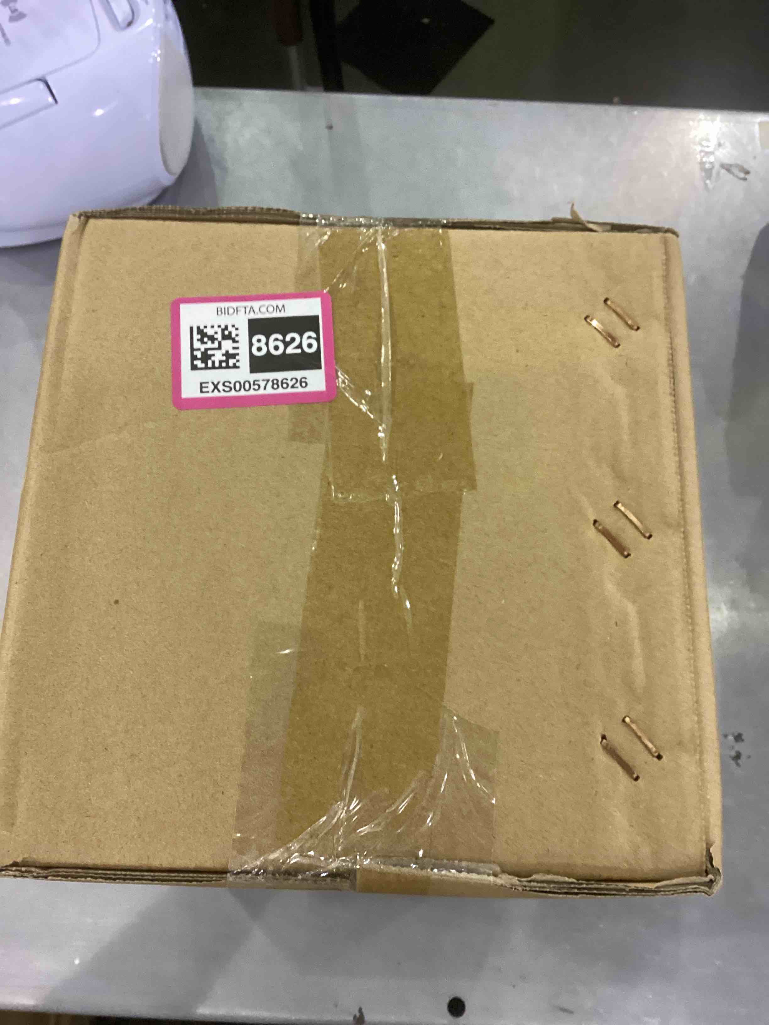 https://s3.amazonaws.com/lotting-images-prod/bidfta/EXS00578626_1694087571568.jpeg