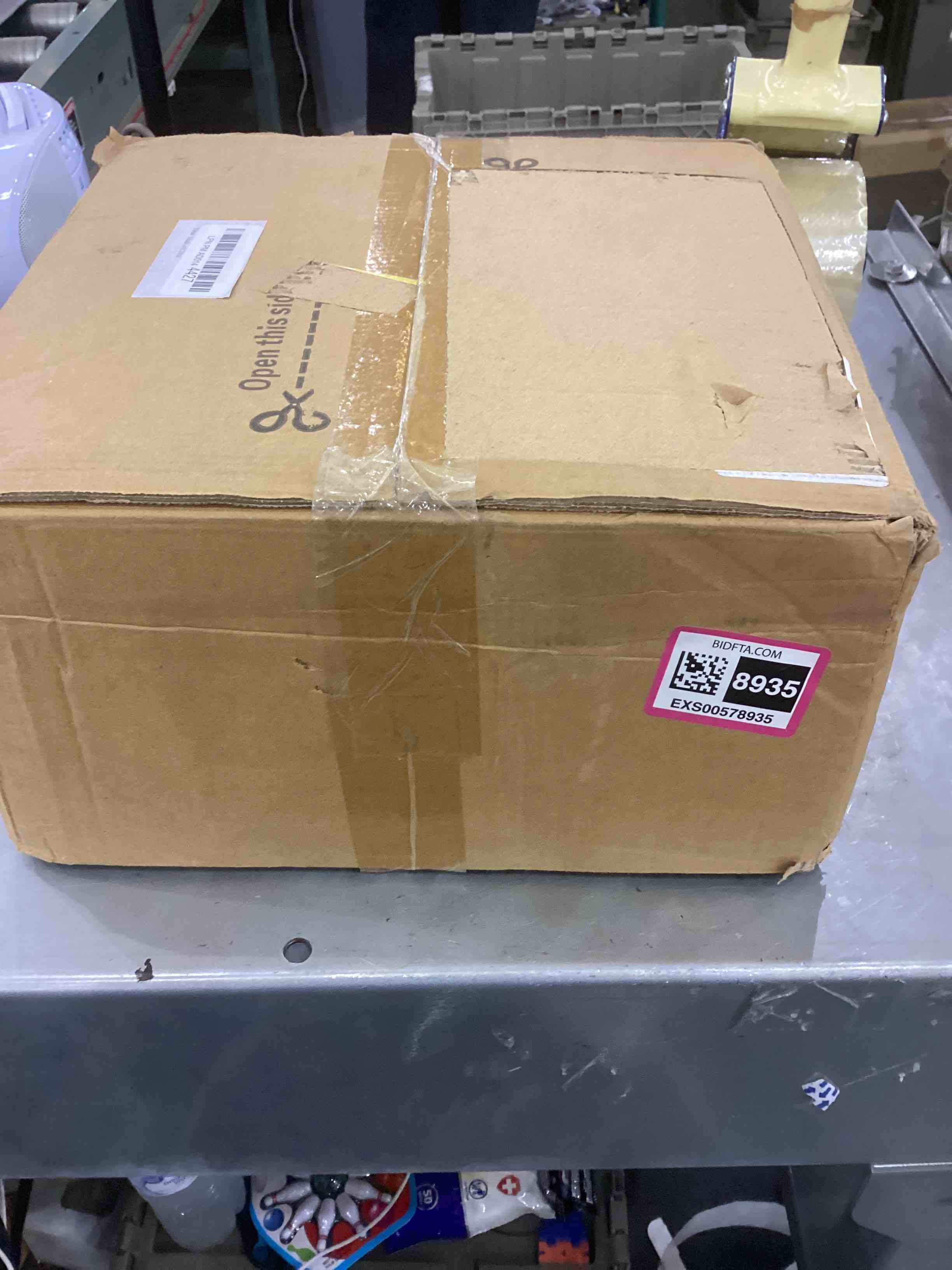 https://s3.amazonaws.com/lotting-images-prod/bidfta/EXS00578935_1694440907161.jpeg