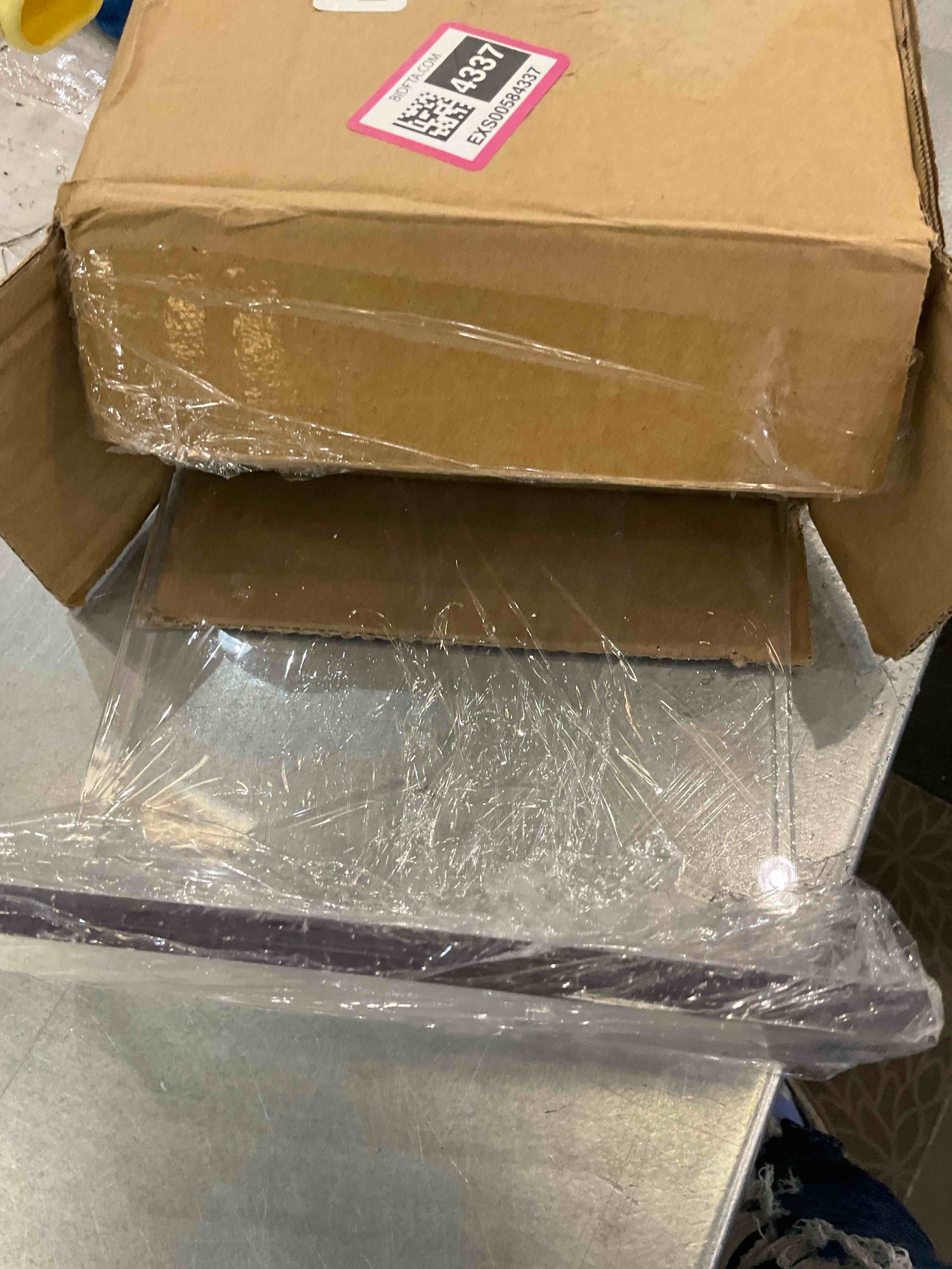 https://s3.amazonaws.com/lotting-images-prod/bidfta/EXS00584337_1702049468880.jpeg
