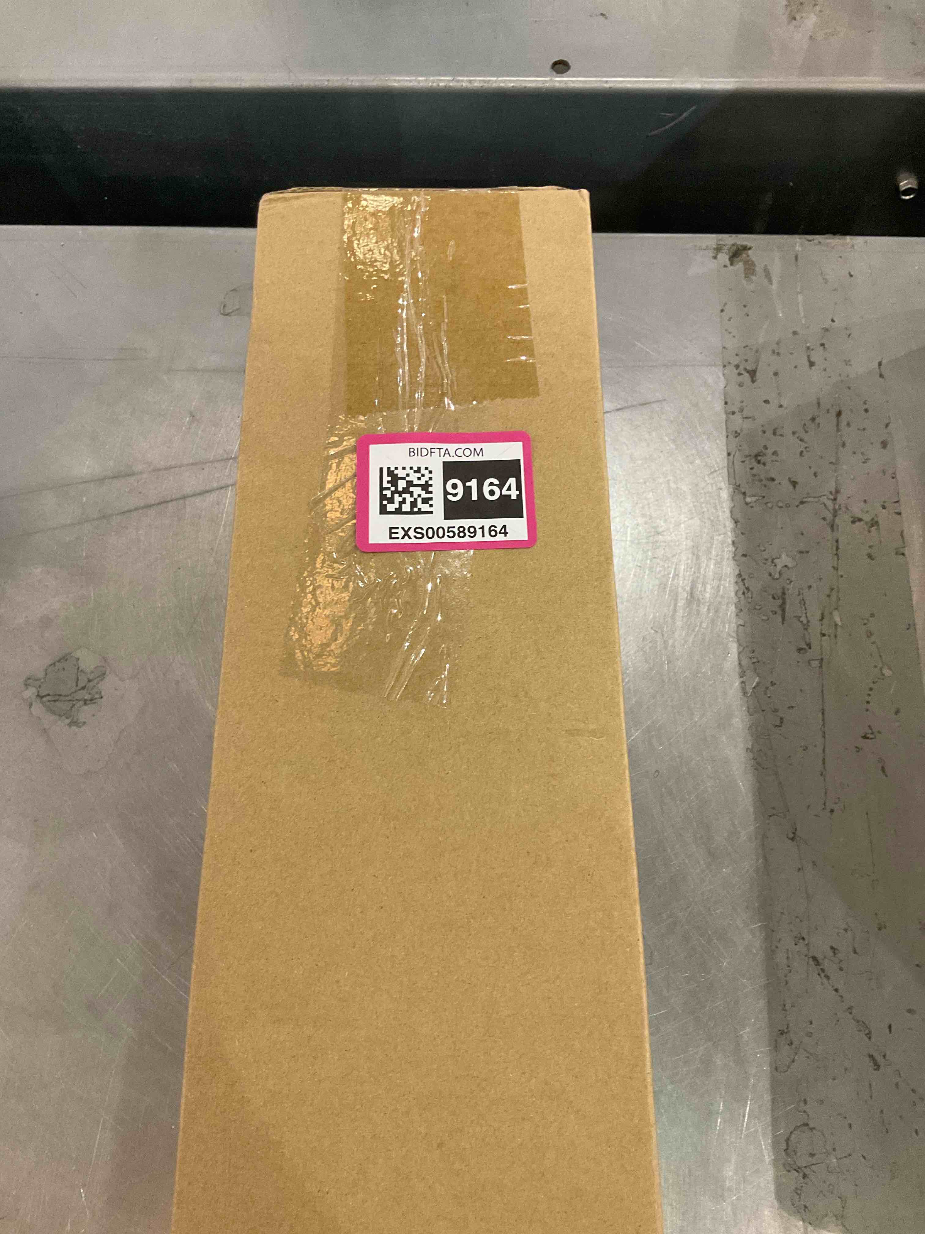 https://s3.amazonaws.com/lotting-images-prod/bidfta/EXS00589164_1702929719239.jpeg